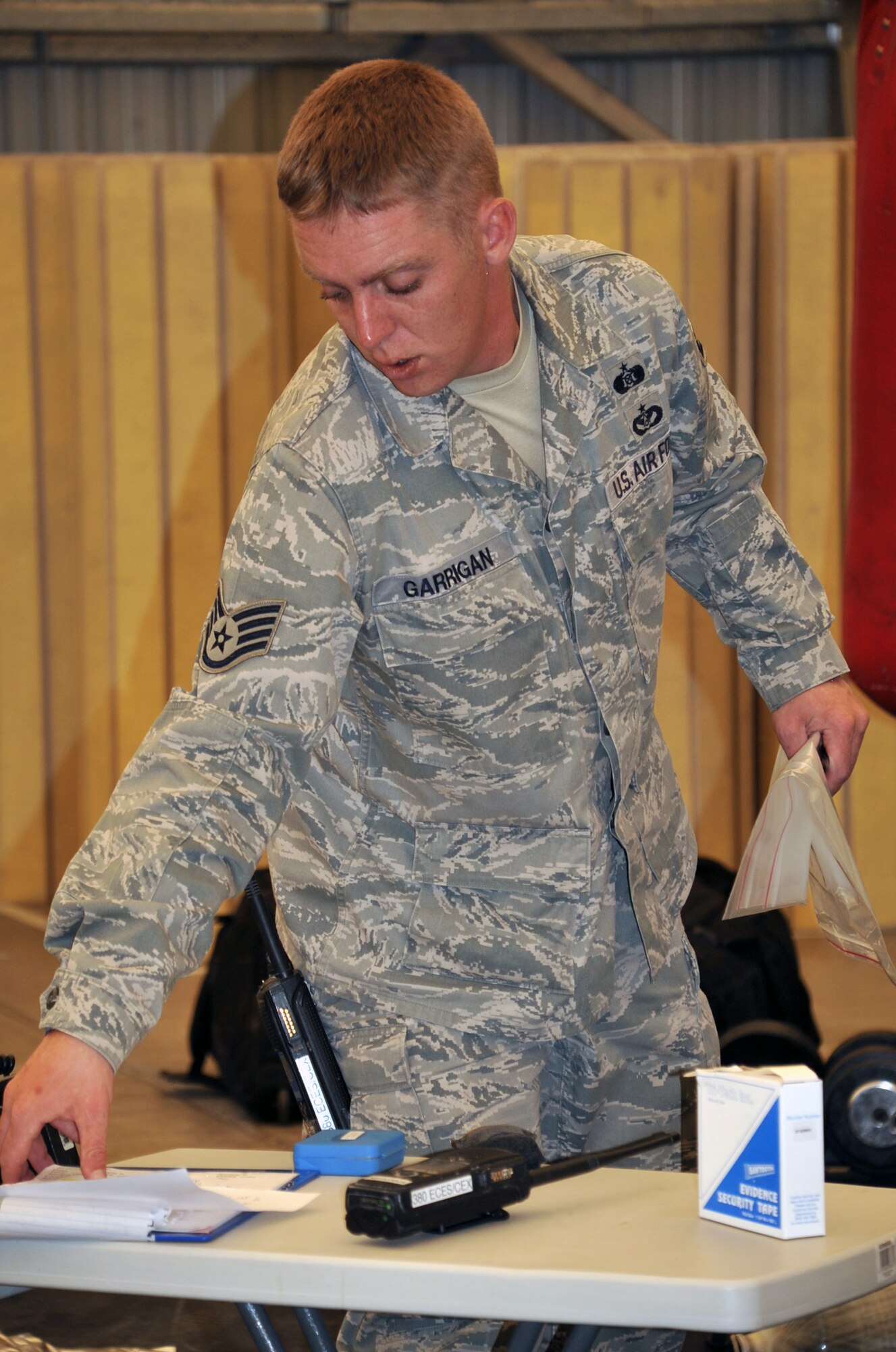 Staff Sgt.Brian Garrigan, emergency management craftsman with the 380th Expeditionary Civil Engineer Squadron emergency management flight, participates in a co-agency training exercise with the 380th Expeditionary Medical Group bioenvironmental engineering section April 9, 2010, at a non-disclosed base in Southwest Asia. The exercise helped maintain readiness and cooperation between agencies for events such as a hazardous material response. Sergeant Garrigan is deployed from the 4th Civil Engineer Squadron at Seymour-Johnson Air Force Base, N.C. (U.S. Air Force Photo/Master Sgt. Scott T. Sturkol/Released)