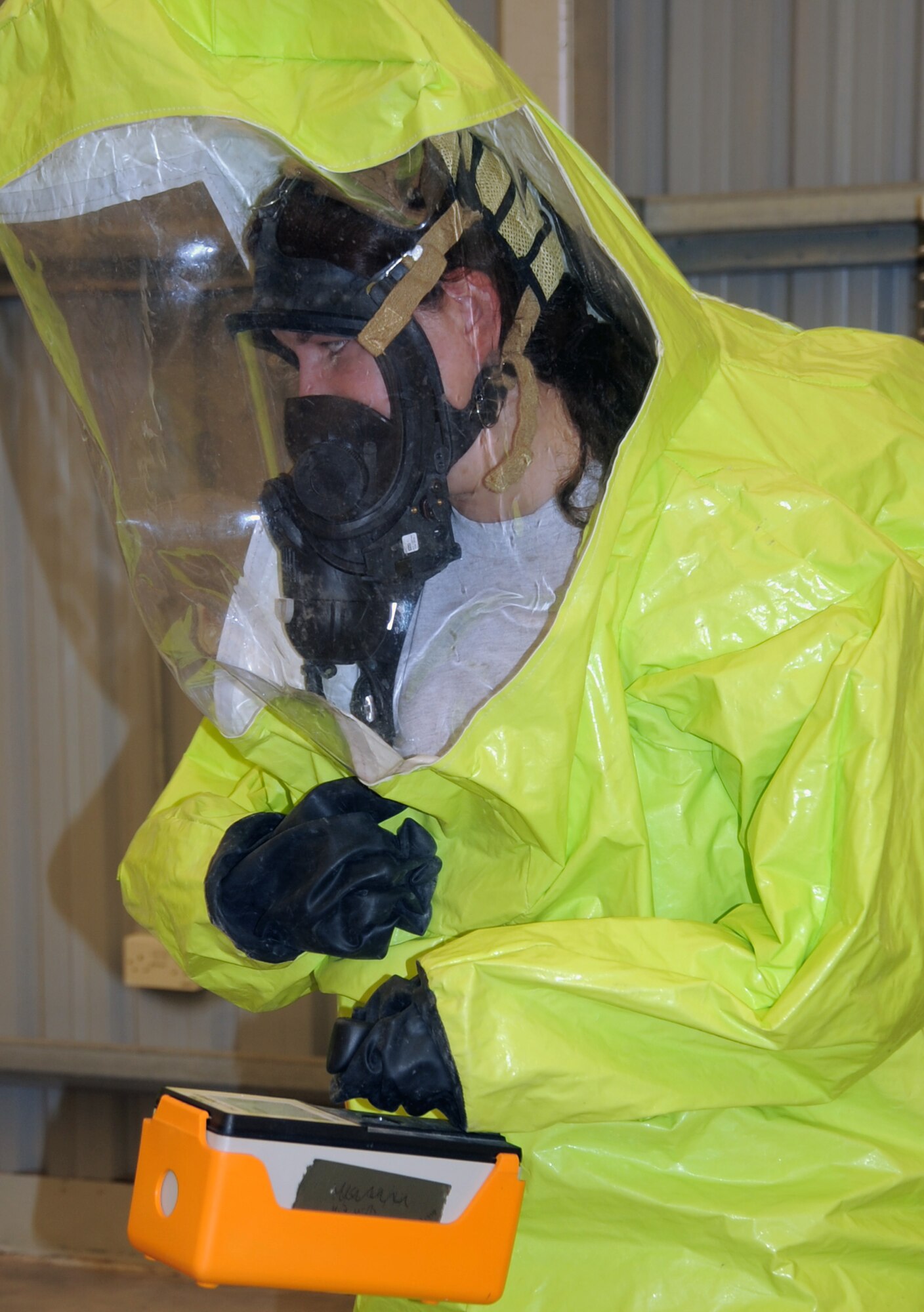 Airman 1st Class Christine Clucas, emergency management journeyman with the 380th Expeditionary Civil Engineer Squadron emergency management flight, participates in a co-agency training exercise with the 380th Expeditionary Medical Group bioenvironmental engineering section April 9, 2010, at a non-disclosed base in Southwest Asia. The exercise helped maintain readiness and cooperation between agencies for events such as a hazardous material response. Airman Clucas is deployed from the 20th Civil Engineer Squadron at Shaw Air Force Base, S.C., and her hometown is Pana, Ill. (U.S. Air Force Photo/Master Sgt. Scott T. Sturkol/Released)