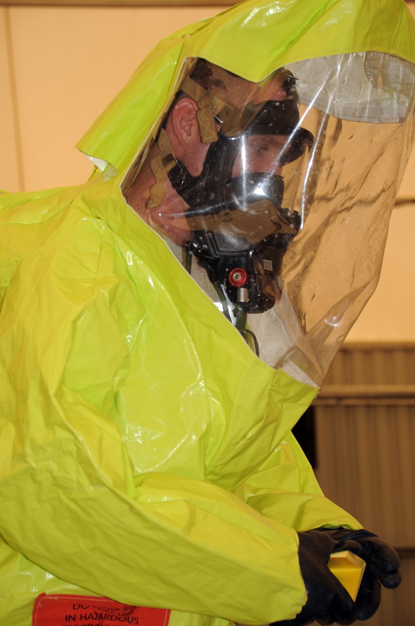 Airman 1st Class Paul Anderson, emergency management journeyman with the 380th Expeditionary Civil Engineer Squadron emergency management flight, participates in a co-agency training exercise with the 380th Expeditionary Medical Group bioenvironmental engineering section April 9, 2010, at a non-disclosed base in Southwest Asia. The exercise helped maintain readiness and cooperation between agencies for events such as a hazardous material response. Airman Anderson is deployed from the 49th Civil Engineer Squadron at Hollomon Air Force Base, N.M., and his hometown is Gurnee, Ill. (U.S. Air Force Photo/Master Sgt. Scott T. Sturkol/Released)
