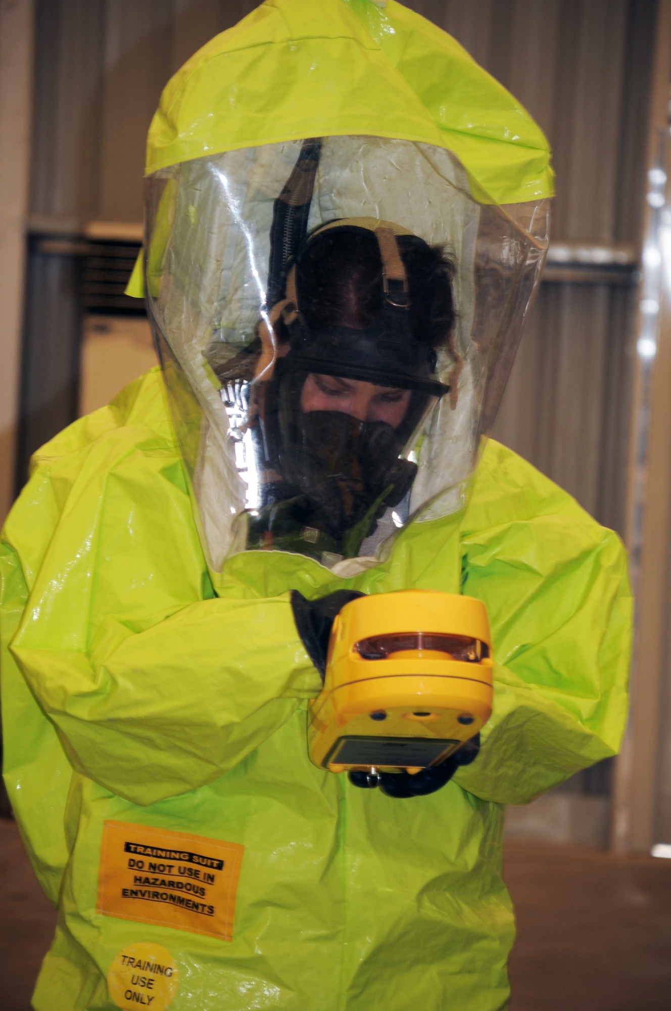Airman 1st Class Christine Clucas, emergency management journeyman with the 380th Expeditionary Civil Engineer Squadron emergency management flight, participates in a co-agency training exercise with the 380th Expeditionary Medical Group bioenvironmental engineering section April 9, 2010, at a non-disclosed base in Southwest Asia. The exercise helped maintain readiness and cooperation between agencies for events such as a hazardous material response. Airman Clucas is deployed from the 20th Civil Engineer Squadron at Shaw Air Force Base, S.C., and her hometown is Pana, Ill. (U.S. Air Force Photo/Master Sgt. Scott T. Sturkol/Released)