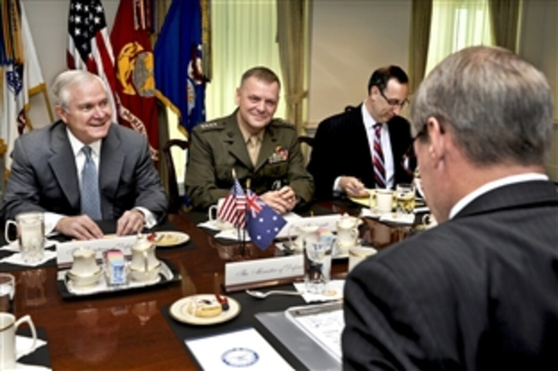 U.S. Defense Secretary Robert M. Gates, left, meets with visiting Australian Defense Minister John Faulkner, right foreground, at the Pentagon, April 12, 2010. The two defense leaders were expected to discuss a range of regional and global security issues. Marine Corps Gen. James E. Cartwright, vice chairman of the Joint Chiefs of Staff, and Robert Scher, deputy assistant defense secretary for South and Southeast Asia, joined Gates.  