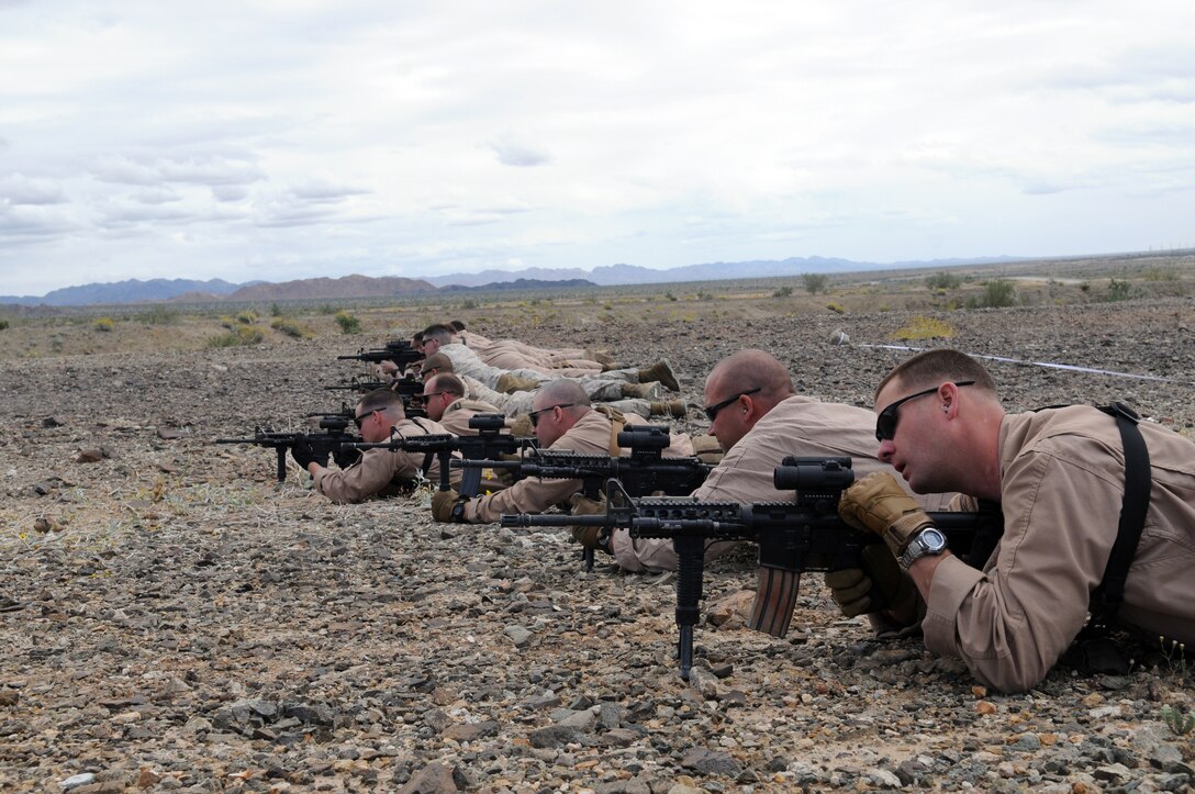 Marine Wing Support Squadron 373 explosive ordnance disposal technicians from Marine Corps Air Station Miramar, Calif., zero their M-4 carbines during close-quarter battle marksmanship training at Camp Billy Machen, Calif., April 12, 2010. MWSS-373's EOD team is being trained by Yuma's MWSS-371 EOD team for an upcoming deployment to Afghanistan. The training was conducted by Master Gunnery Sgt. Carl Holden, MWSS-371's EOD staff noncommissioned officer in charge, who is a former Marine Special Operations Command close-quarter battle instructor. The training used both M-4s and M-9 pistols, with emphasis on transitioning from the rifle to the pistol in CQB situations. "When your rifle runs dry, you've got another loaded weapon with you. Use it!" said Holden.