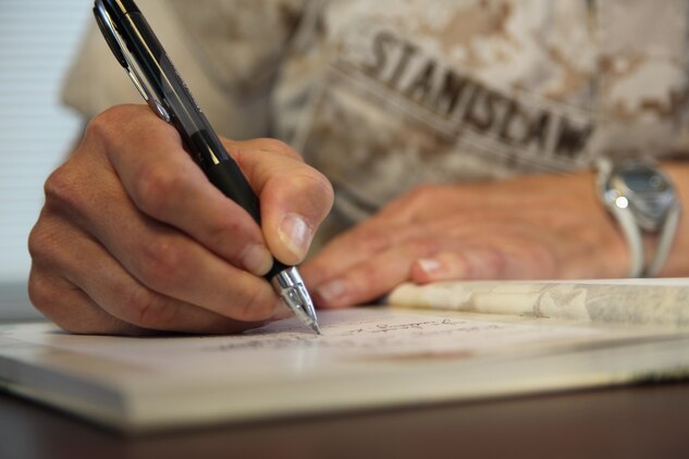 Stanislaw writes in the journal she frequently uses to collect her thoughts and poems, and she has started writing poetry for her second book.