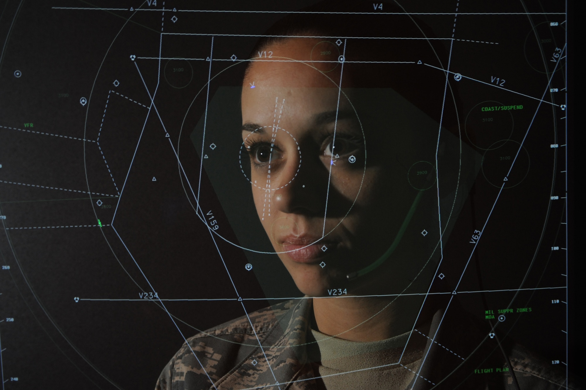 WHITEMAN AIR FORCE BASE, Mo. - Staff Sgt. Michelle Salyer, 509th Operations Support Squadron air traffic controller, works the approach position, ensuring the safety of air traffic in her airspace.  Approach controllers guide aircraft during instrument flight.(U.S. Air Force photo/Staff Sgt. Jason Huddleston)

