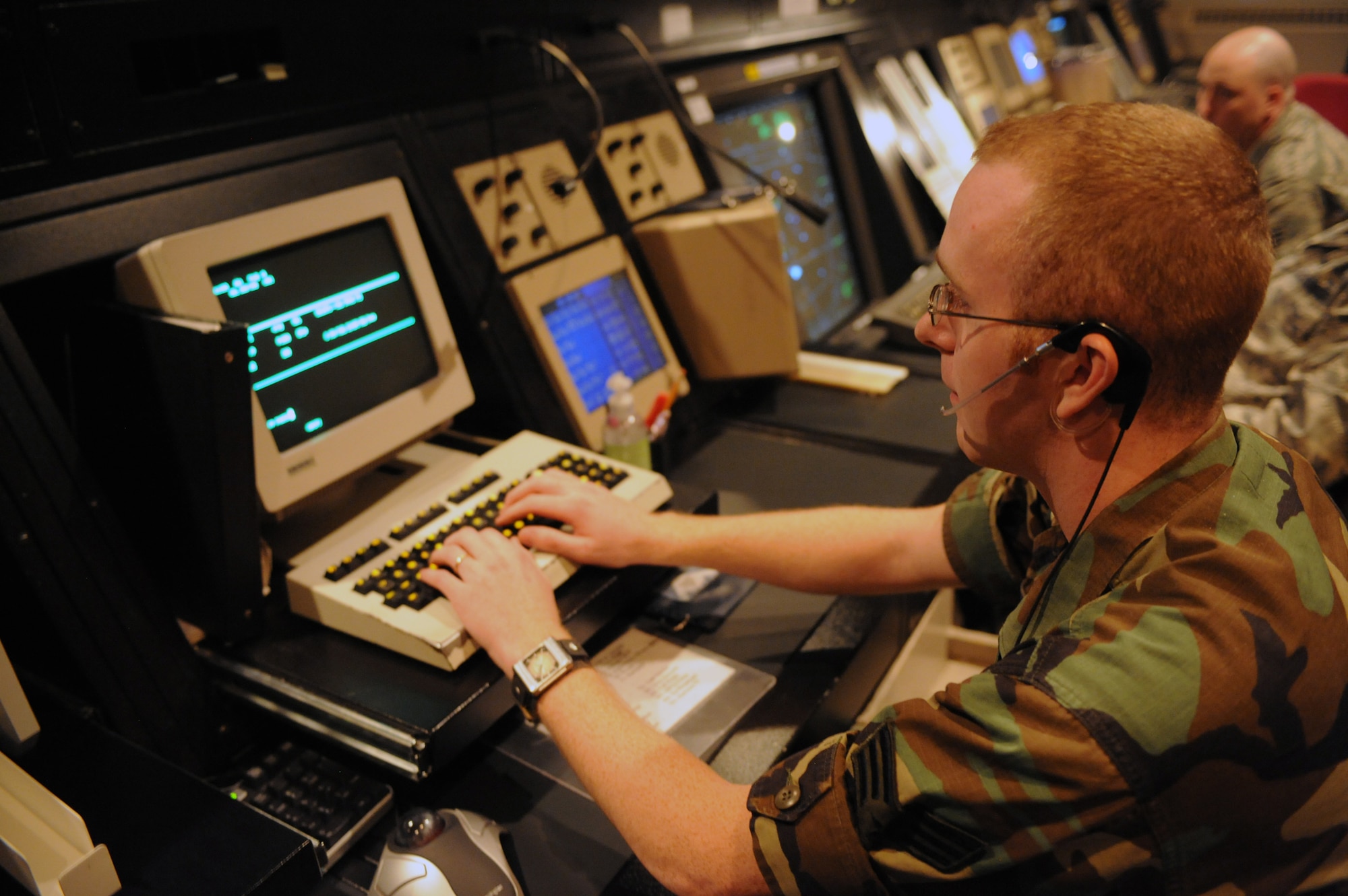 WHITEMAN AIR FORCE BASE, Mo. - Senior Airman Ben Leneave, 509th Operations Support Squadron air traffic controller, modifies a flight plan for an aircraft transitioning Whiteman's airspace. This notifies other facilities of a change in the aircraft's destination.(U.S. Air Force photo/Staff Sgt. Jason Huddleston)


