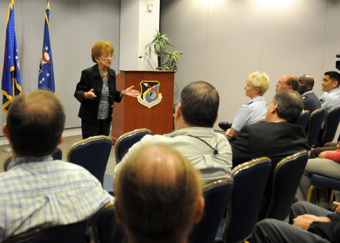 Holocaust survivor Regina Hirsch recounts her terrifying experiences and the miracle of survival to the group gathered to listen to her speak during the Space and Missile Systems Center Holocaust Memorial Observance, April 12. Ms Hirsch endured beatings and hunger and witness torture and murder of Jews, including her own family, during the Holocaust. (Photo by Joe Juarez)