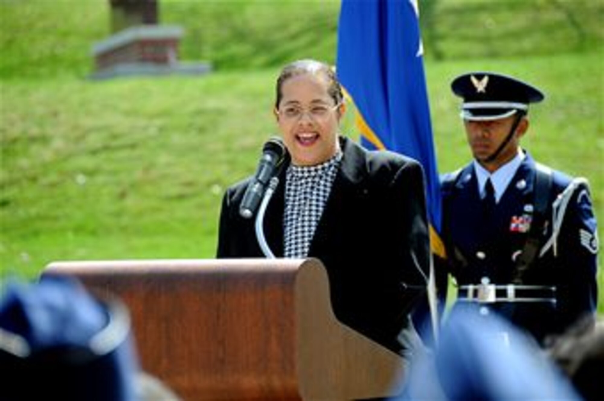 Dr. Janet Tull, the daughter of the late Lt. Col. Harrison "Harry" Tull, speaks about her father's accomplishments and how he inspired her to pursue a career in the medical field, during the dedication of Tull Road April 6, 2010, on Offutt Air Force Base, Neb.  Colonel Tull, who recently passed away, was a Tuskegee Airman during World War II and a former officer in the 55th Wing at Offutt AFB.  He served more than 27 years in the Air Force, including combat tours in the Korean and Vietnam wars. (U.S. Air Force photo/Kendra Williams)

