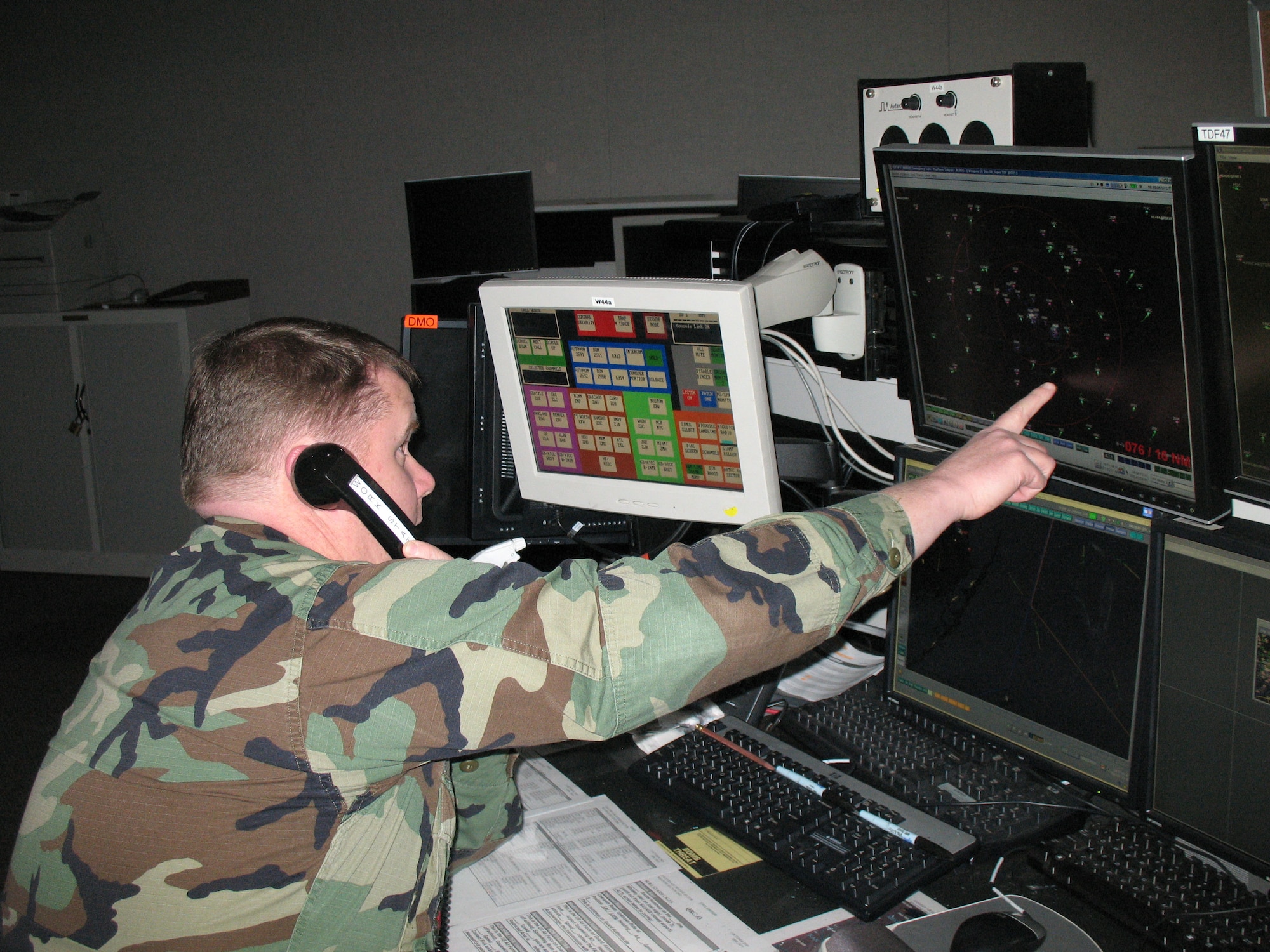 Capt. Chris Crumb, a Weapons Controller at the Eastern Air Defense Sector, simulates controlling a mission. Recently, Weapons and Tactics shop held the unit?s first-ever semiannual ?Top Scope? competition. The competition is designed to help members of the unit achieve one of the overarching goals of the Sector, which is to improve mission effectiveness.