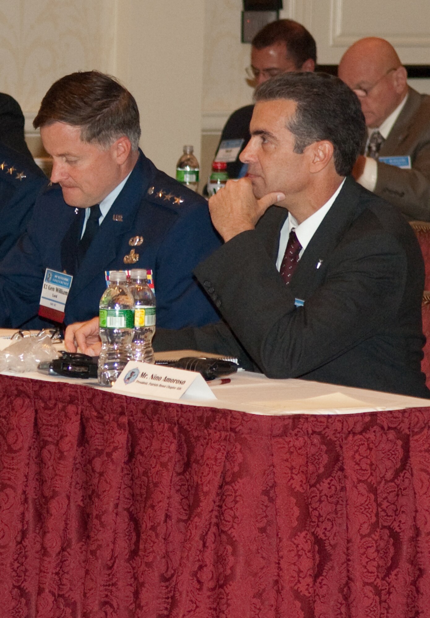 Ronald Mason, Program Executive Officer for Cyber and Net-centric Systems, sits with Lt. Gen. William Lord, Air Force chief of Warfighting Integration and Chief Information Officer, during the Net-centric Operations Conference in New Hampshire Sept. 22, 2009.  Mr. Mason assumed his PEO duties as part of an Air Force-wide acquisition improvement initiative last month.  (U.S. Air Force Photo by Rick Berry)