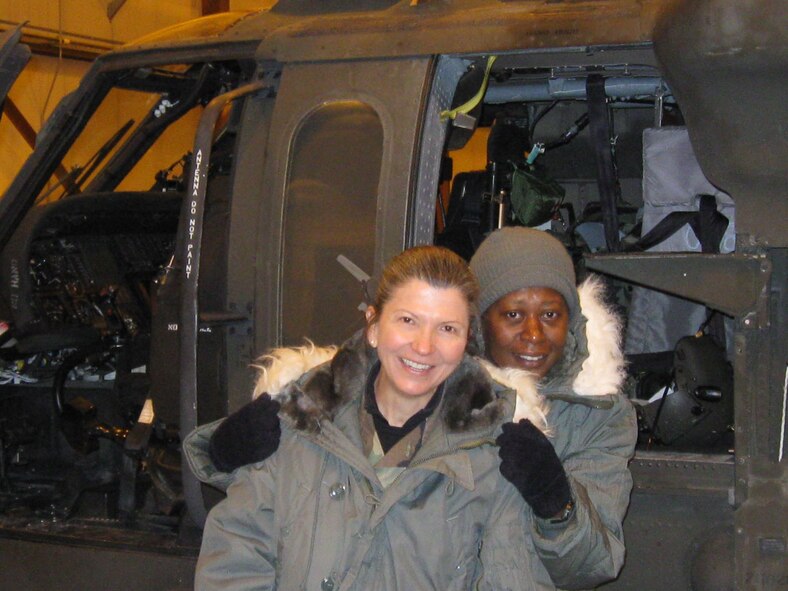 Lt. Col. Frances McClure (front) and Master Sgt. Julia McKenzie deployed to Alaska to provide healthcare to residents in rural areas. Both are reservists with the 916th Aerospace Medicine Flight. (USAF photo courtesy of 916ARW/AMDF) 