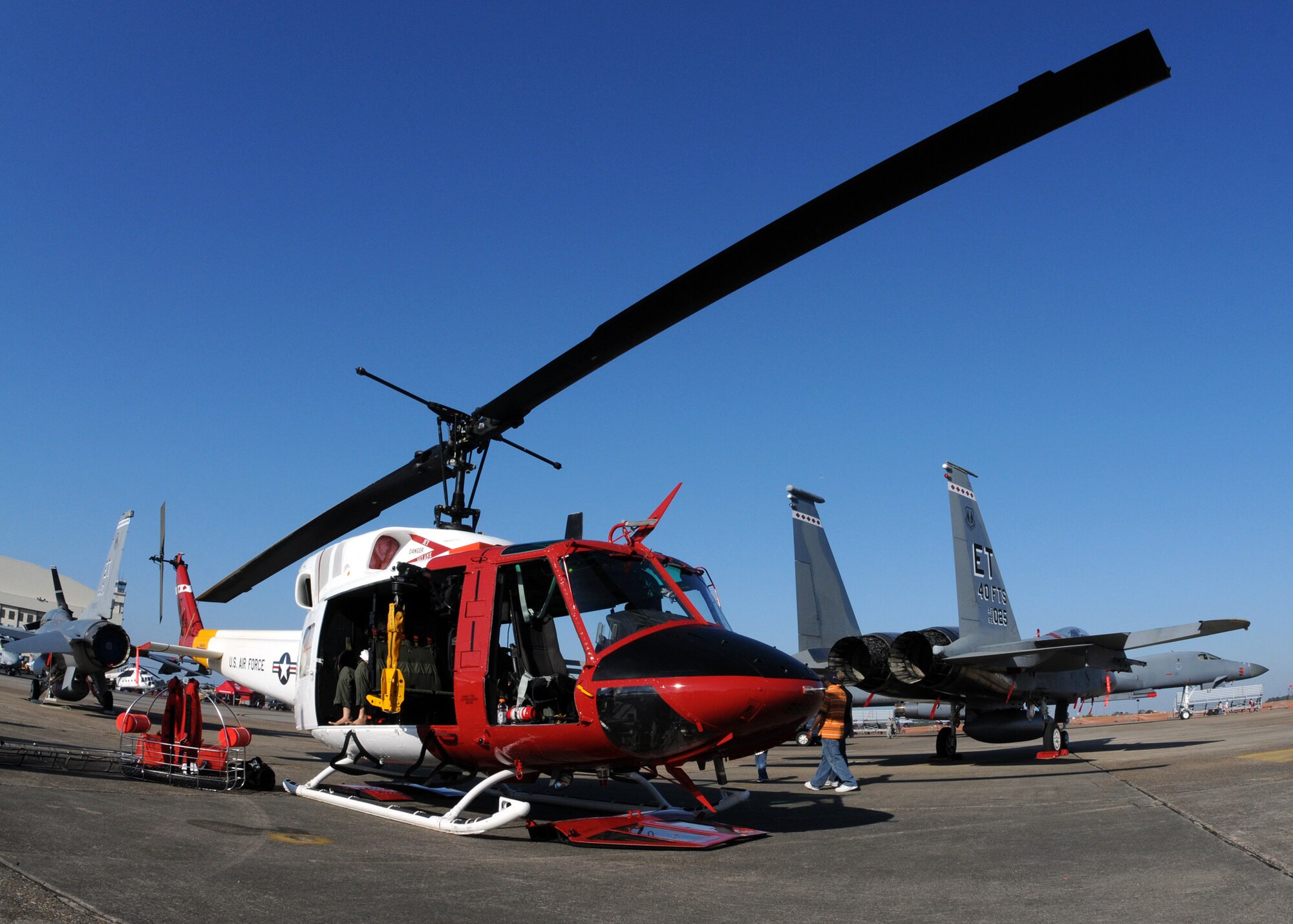 46th Test Wing aircraft sit on display at the 75th Anniversary Air Show April 11. More than 125,000 were in attendance during the air show April 10-11, enjoying a variety of aerial performances and static displays. This was Eglin’s first open house since 2007 and was timed to coincide with the 75th anniversary of the installation. The F-22A Raptor demo, Army Black Daggers and "Tora, Tora, Tora" were some of the highlights of the event. (U.S. Air Force photo/ Tech. Sgt. Cheryl Foster.)