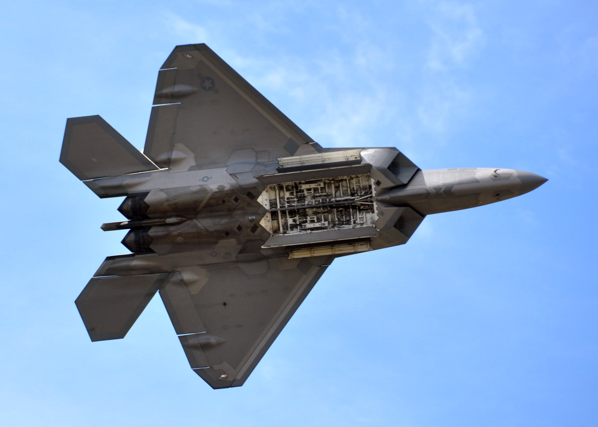 EGLIN AIR FORCE BASE, Fla. – An F-22A Raptor performs a flyby during the 75th Anniversary Air Show April 10. More than 125,000 were in attendance during the air show April 10-11, enjoying a variety of aerial performances and static displays. This was Eglin’s first open house since 2007 and was timed to coincide with the 75th anniversary of the installation. The Thunderbirds, Army Black Daggers and "Tora, Tora, Tora" were some of the highlights of the event. (U.S. Air Force photo/ Airman 1st Class Rachel Elsea)