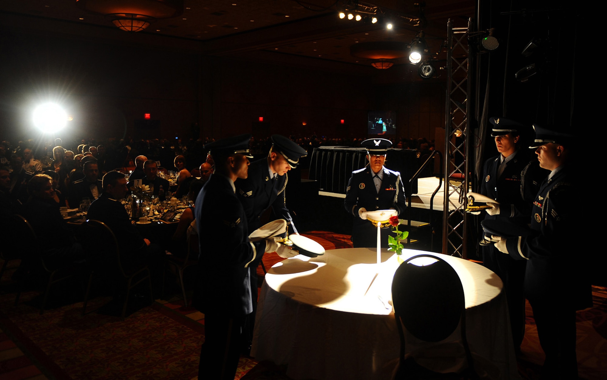 OFFUTT AIR FORCE BASE, Neb. ? The 55th Wing Honor Guard places service hats on the Prisoners of War table while more than 800 attendees look on during the 2010 55th Wing Birthday Ball at Embassy Suites in La Vista, Neb., April 10. The ceremoy paid tribute to servicemembers who are, or ever have been POWs or missing in action. The ball honored the wing?s past and celebrated the current role of the Fightin Fifty-Fifth in today?s Air Force. U.S. Air Force photo by Josh Plueger
