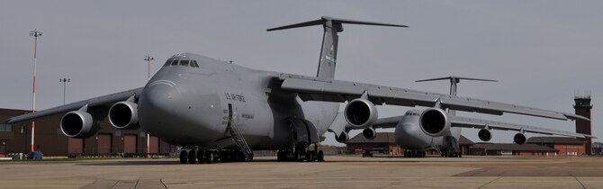 RAF MILDENHALL, England – A C-5M Super Galaxy (front) receives fuel here en route back to the United States after completing a mission to Afghanistan.  The aircraft, based at Dover Air Force Base, Del., is one of three in the Air Force’s inventory, and has only been flying operational missions since January.  The C-5M is essentially a C-5B Galaxy with newer engines, a new computer system and other upgrades.  This is the first time a Super Galaxy has stopped at RAF Mildenhall while completing an operational mission.  (U.S. Air Force photo/Staff Sgt. Austin M. May)