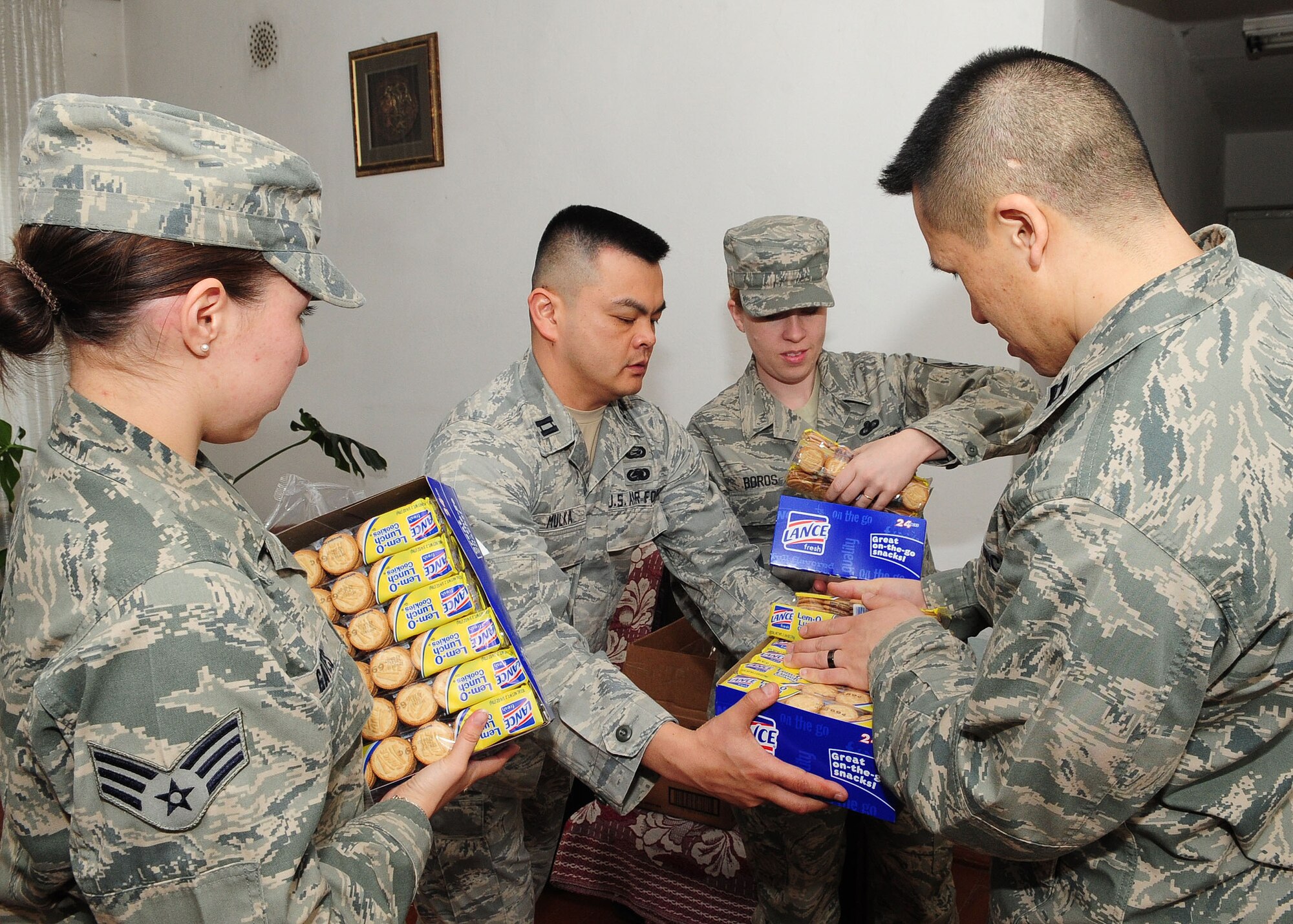 U.S. Airmen from the Transit Center at Manas, Kyrgyzstan, collected 8,000 COM (almost $200) and bought the Belovodsky Orphanage basic items including sugar, rice, beans, tea, clothing and other necessities April 13, 2010. The trip was organized by humanitarian assistance director Lt. Col. Neal Linch and the Manas Area Benefit Outreach Society. Some donations were also given by Americans stateside for this and other humanitarian assistance projects in the city and surrounding areas. (U.S. Air Force photo/Senior Airman Nichelle Anderson/released)