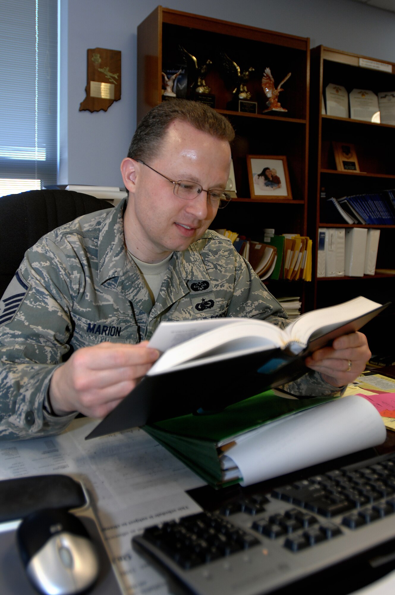 GRISSOM AIR RESERVE BASE, Ind. -- Master Sgt. Wes Marion, 434th Air Refueling Wing law office superintendant, researches federal law during the April unit training assembly. Sergeant Marion was recently named Air Force Reserve Command Outstanding Category A Paralegal of the Year 2009. (U.S. Air Force photo/Tech. Sgt. Mark R. W. Orders-Woempner)