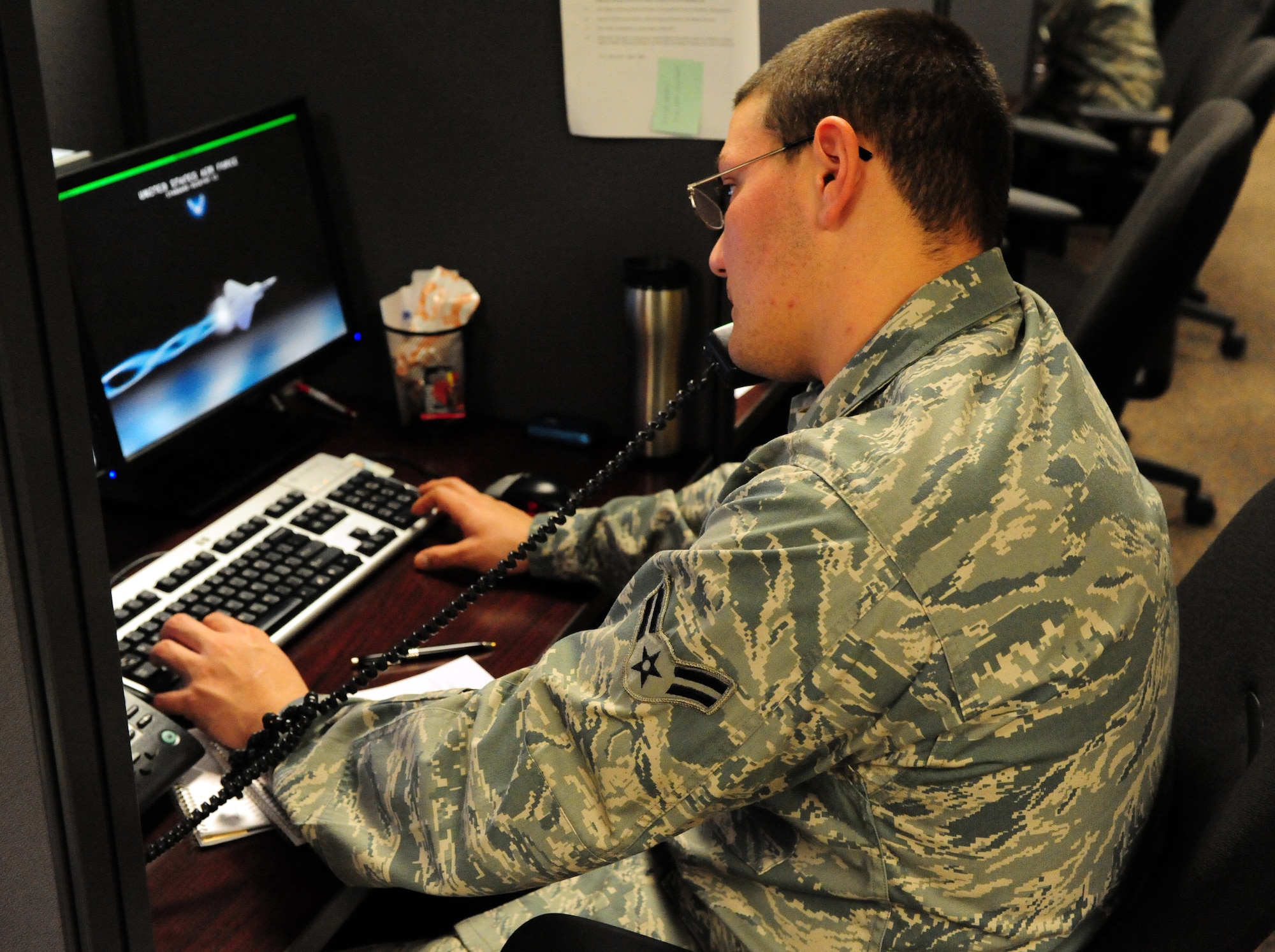100409-F-6838W-031
SHAW AIR FORCE BASE, S.C. -- Airman First Class Emmanuel Rivera, helps a client over the phone Apr. 9, 2010. The Client Service Center supports customers with a wide variety of computer and communication troubleshooting issues. (U.S. Air Force photo/Airman 1st Class Neil D. Warner)
