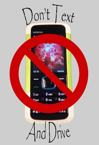 President Barack Obama recently issued a texting while driving ban for federal employees while behind the wheel on government business. Additionally, Air Force Instruction 91-207 Traffic Safety Program does state drivers are not allowed to use cell phones without a hands-free device on or off base, including texting. (U.S. Air Force graphic by Senior Airman Amanda Dick)