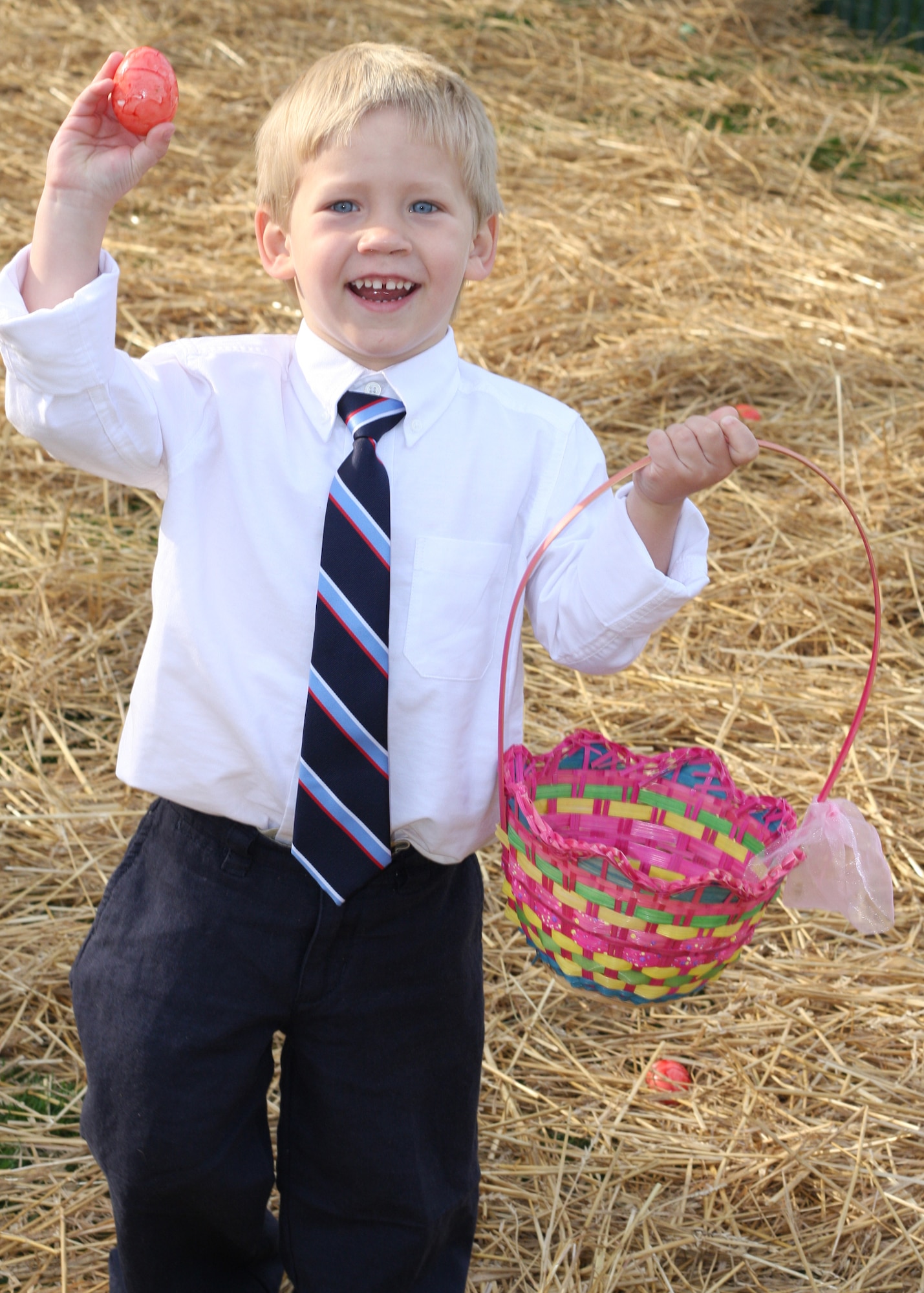 Emmett, 3-year-old son of Capt. Greg Voth, 689th Armament Systems Squadron, finds an egg during the during the Easter Egg Roll event at the White House April 5. Team Eglin warriors and their families were invited to particpate in the event. (Courtesy photo.) 
