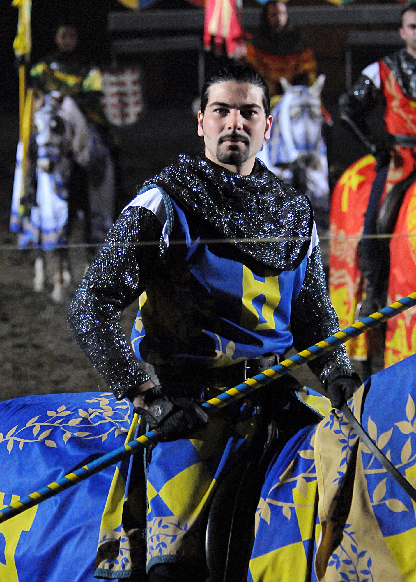 A knight taunts the fans of his opponents before charging through the sand-filled arena during a jousting event April 10 at Medieval Times Restaurant and Show in Verona, Italy.  For information on the next guided Verona and Medieval Dinner Show, call Aviano Information, Tickets and Travel at 632-3107.  (U.S. Air Force photo/Senior Airman Tabitha M. Mans)