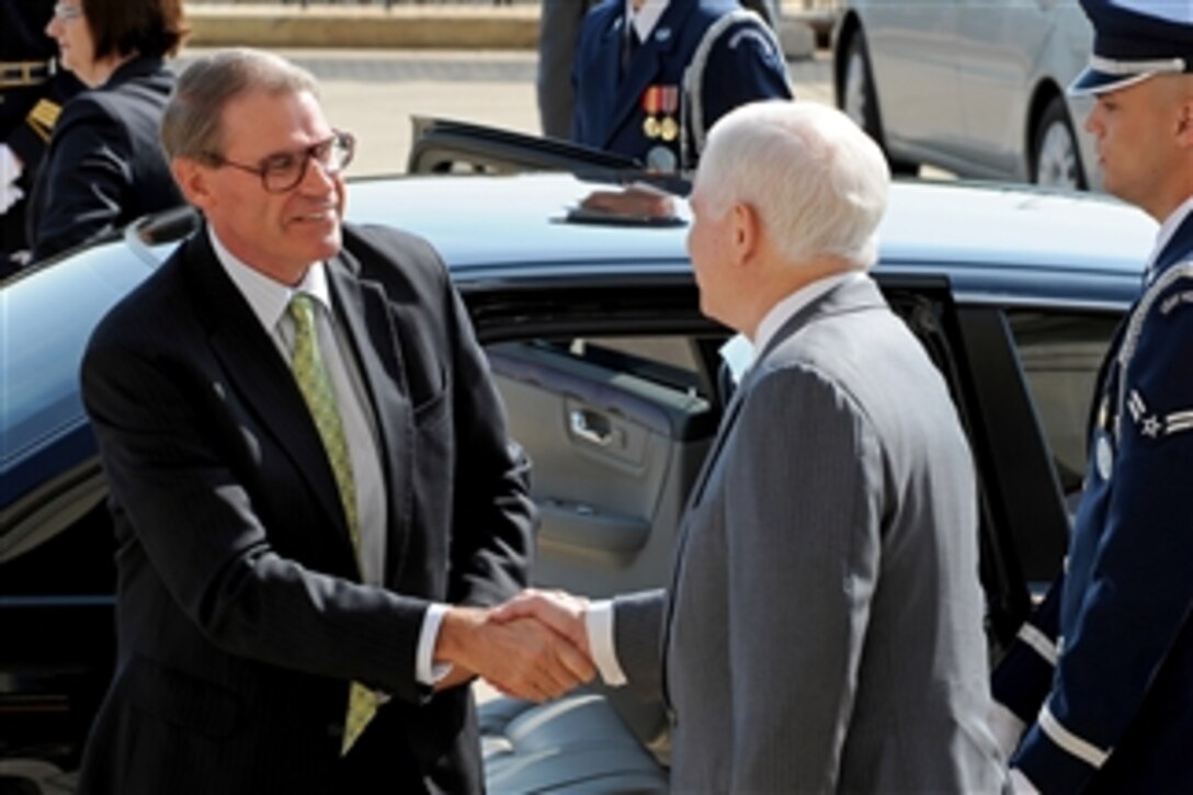 Australian Minister for Defense John Faulkner arrives at the Pentagon and is welcomed by Secretary of Defense Robert M. Gates.  Faulkner and Gates will hold bilateral security talks on a range of issues.  