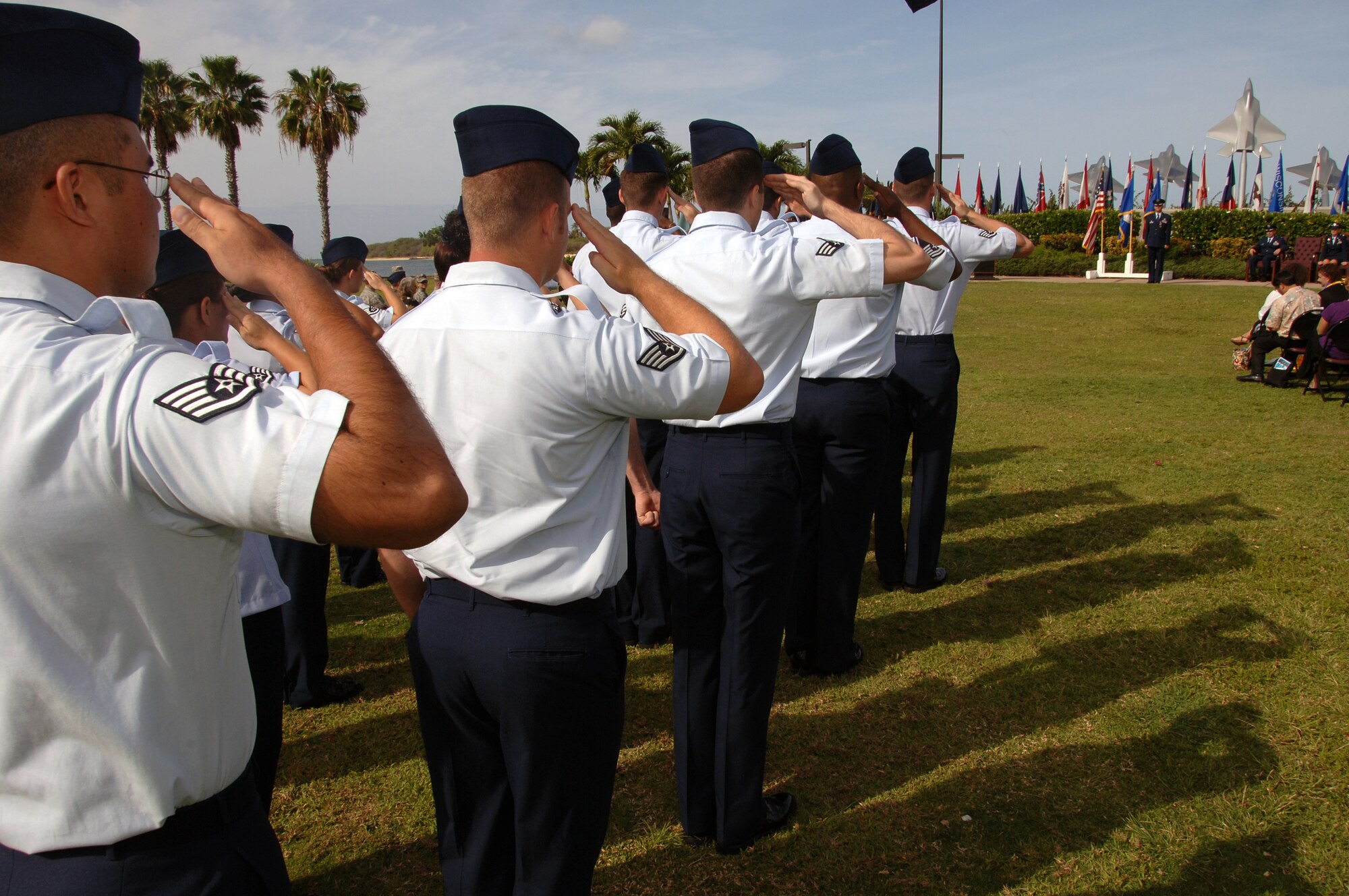 Members of the newly formed 15th Force Support Squadron present arms at the 15 FSS Activation and Assumption of Command ceremony here April 14. During the ceremony, the 15th Mission Support Squadron and the 15th Services Squadron were deactivated and then re-activated jointly as the 15 FSS. (U.S. Air Force photo by Senior Airman Nathan Allen)
