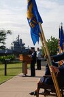 Col. Charles Baumgardner, 15th Mission Support Group commander , delivers a speech at the 15th Force Support Squadron Activation and Assumption of Command ceremony here April 14. During the ceremony, the 15th Mission Support Squadron and the 15th Services Squadron were deactivated and then re-activated jointly as the 15 FSS. (U.S. Air Force photo by Senior Airman Nathan Allen)