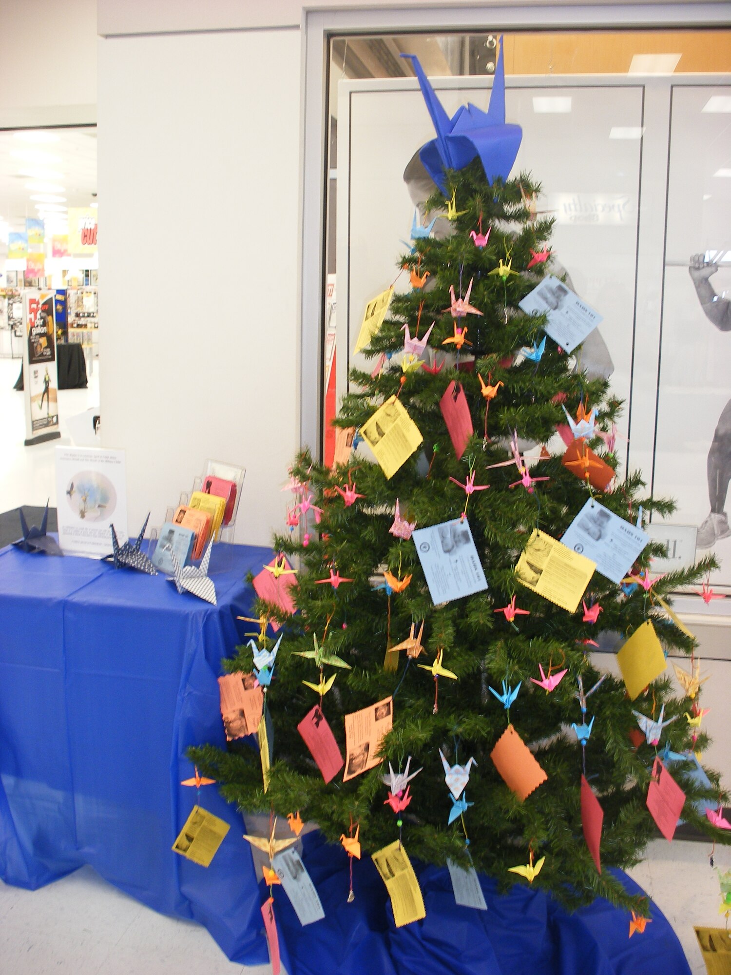 BUCKLEY AIR FORCE BASE, Colo. -- Buckley Air Force Base Family Advocacy has set up a Resource Tree at the Buckley Base Exchange in support of the Month of the Military Child / Child Abuse Prevention Month. On the tree are program and class cards to remind military personnel of available opportunities for military families. (U.S. Air Force photo)