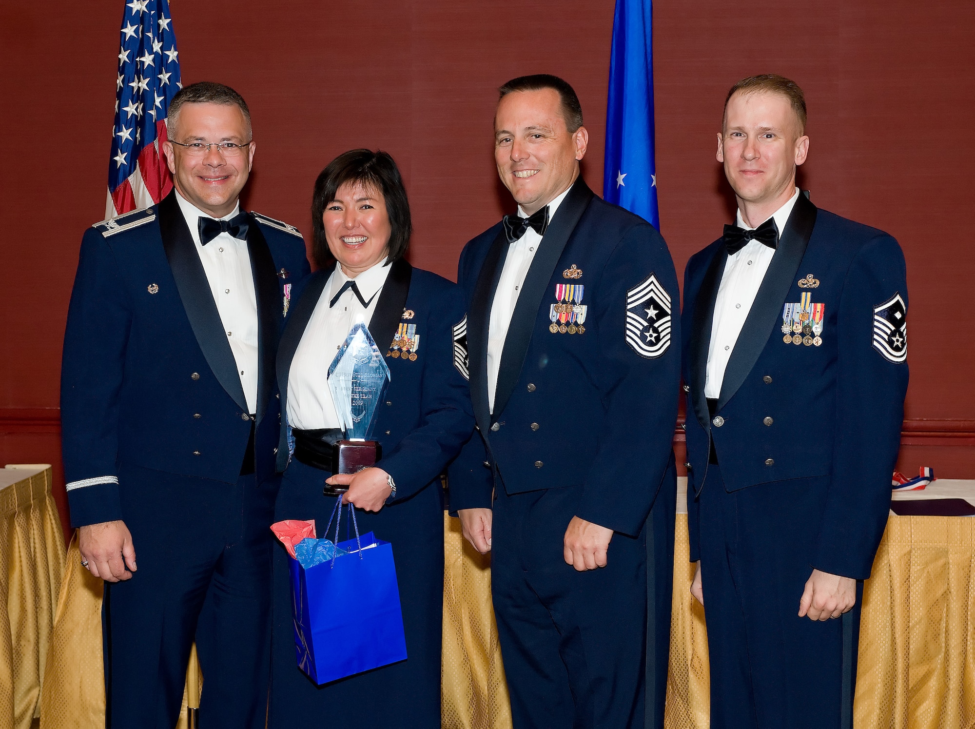 Chief Master Sgt. Suzy Florian, 512th Aircraft Maintenance Squadron, is the 2009 512th Airlift Wing First Sergeant of the Year. She was recognized for her accomplishments during the 512th AW Annual Awards Banquet April 10 at the Sheraton in Dover. (U.S. Air Force photo/Jason Minto) 