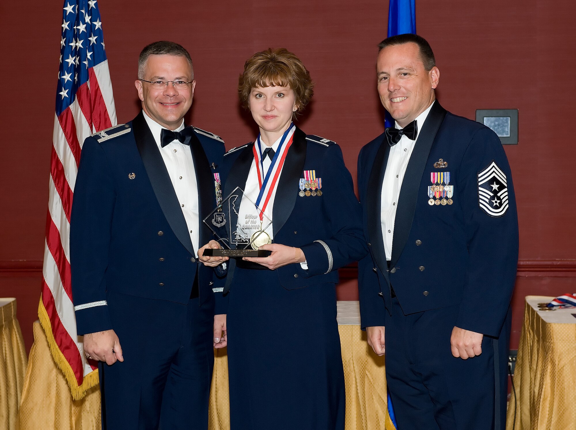Capt. Crystal Beach, 512th Airlift Wing executive officer, is the 2009 512th Airlift Wing Company Grade Officer of the fourth quarter. She was recognized for her accomplishments during the 512th AW Annual Awards Banquet April 10 at the Sheraton in Dover. (U.S. Air Force photo/Jason Minto) 