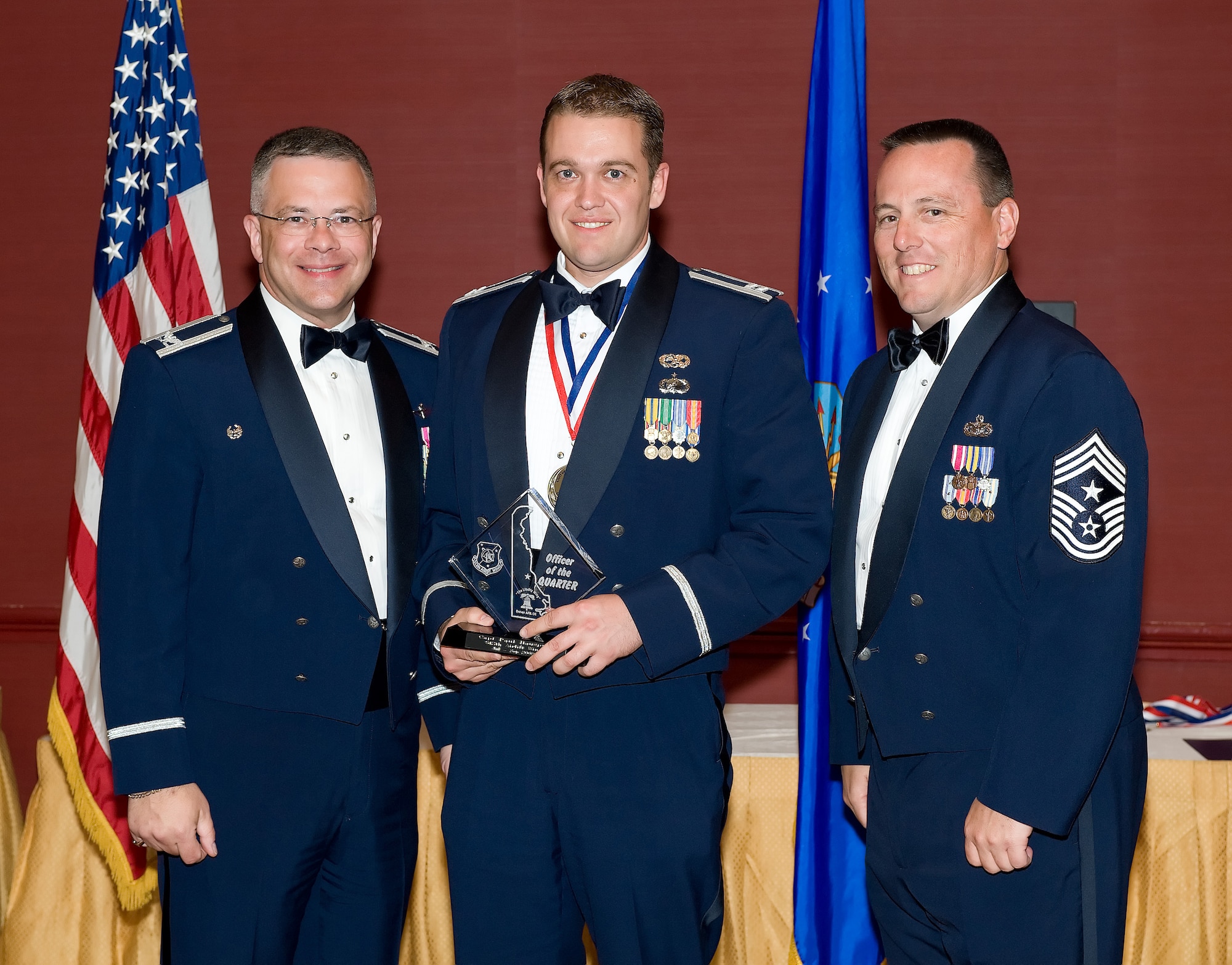 Capt. Paul Hauspurg, 512th Maintenance Squadron, is the 2009 512th Airlift Wing Company Grade Officer of the third quarter. He was recognized for his accomplishments during the 512th AW Annual Awards Banquet April 10 at the Sheraton in Dover. (U.S. Air Force photo/Jason Minto) 