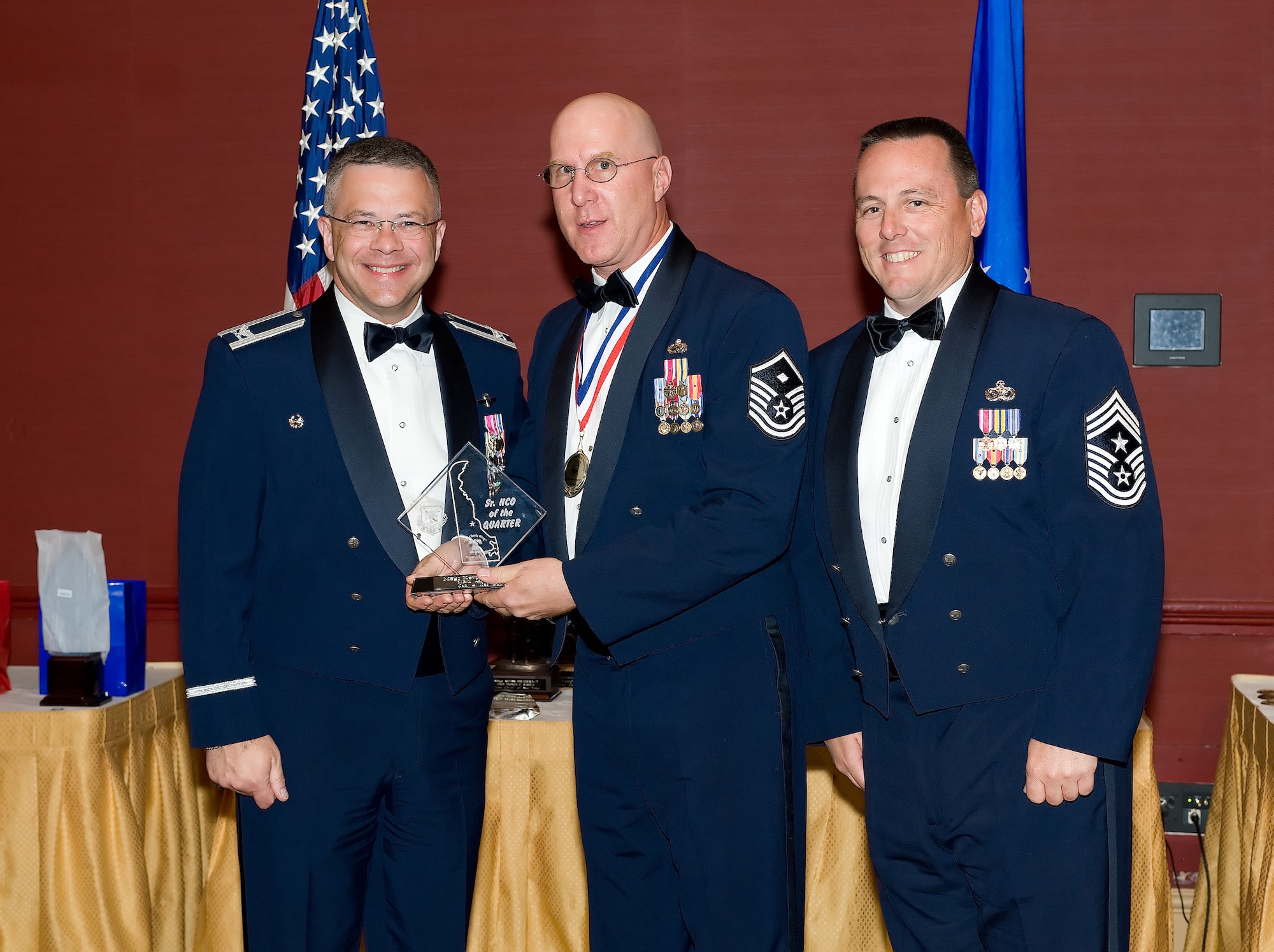 Senior Master Sgt. Kevin Morrow, 326th Airlift Squadron, is the 2009 512th Airlift Wing Senior NCO of the first quarter. He was recognized for his accomplishments during the 512th AW Annual Awards Banquet April 10 at the Sheraton in Dover. (U.S. Air Force photo/Jason Minto) 