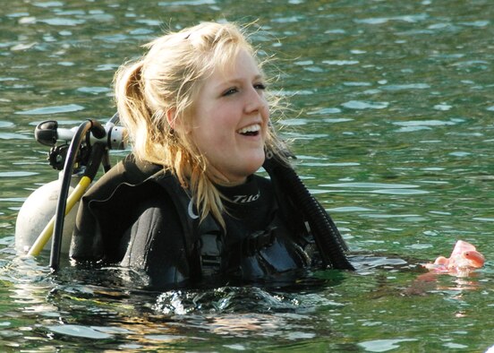 Melissa Sharp, daughter of Ken Sharp, 681st Armament Systems Squadron, adjusts to the chilly water temperature of Vortex Spring during Day 3 of the certification course taught here at Eglin.  The class is four days over two weekends and it occurs once a month.  After taking the course, students will be certified to dive in up to 60 feet of water.  Anyone interested in attending the class, can call 850-217-1261.  (U.S. Air Force photo/Samuel King Jr.)