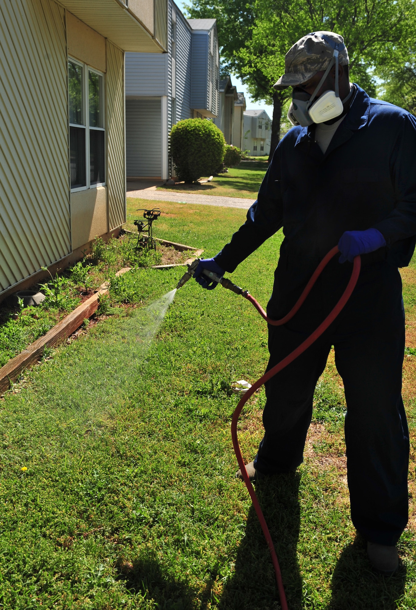 100412-F-8430J-090
SHAW AIR FORCE BASE, S.C. - Senior Airman Terrence Murray, 20th Civil Engineer Squadron entomologist, sprays Phantom Pesticide around the edges of a home on base April 12, 2010. The Phantom Pesticide is used to eliminate any unwanted bugs or pests. The 20th CES entomologists specialize in pest control, eliminating weeds, and conducting health inspections. The 20th CES entomologists are vital to the Air Force since they are in charge of diseases and pest control so troops and families can stay healthy.  (U.S. Air Force photo/Airman 1st Class Amber E. N. Jacobs)