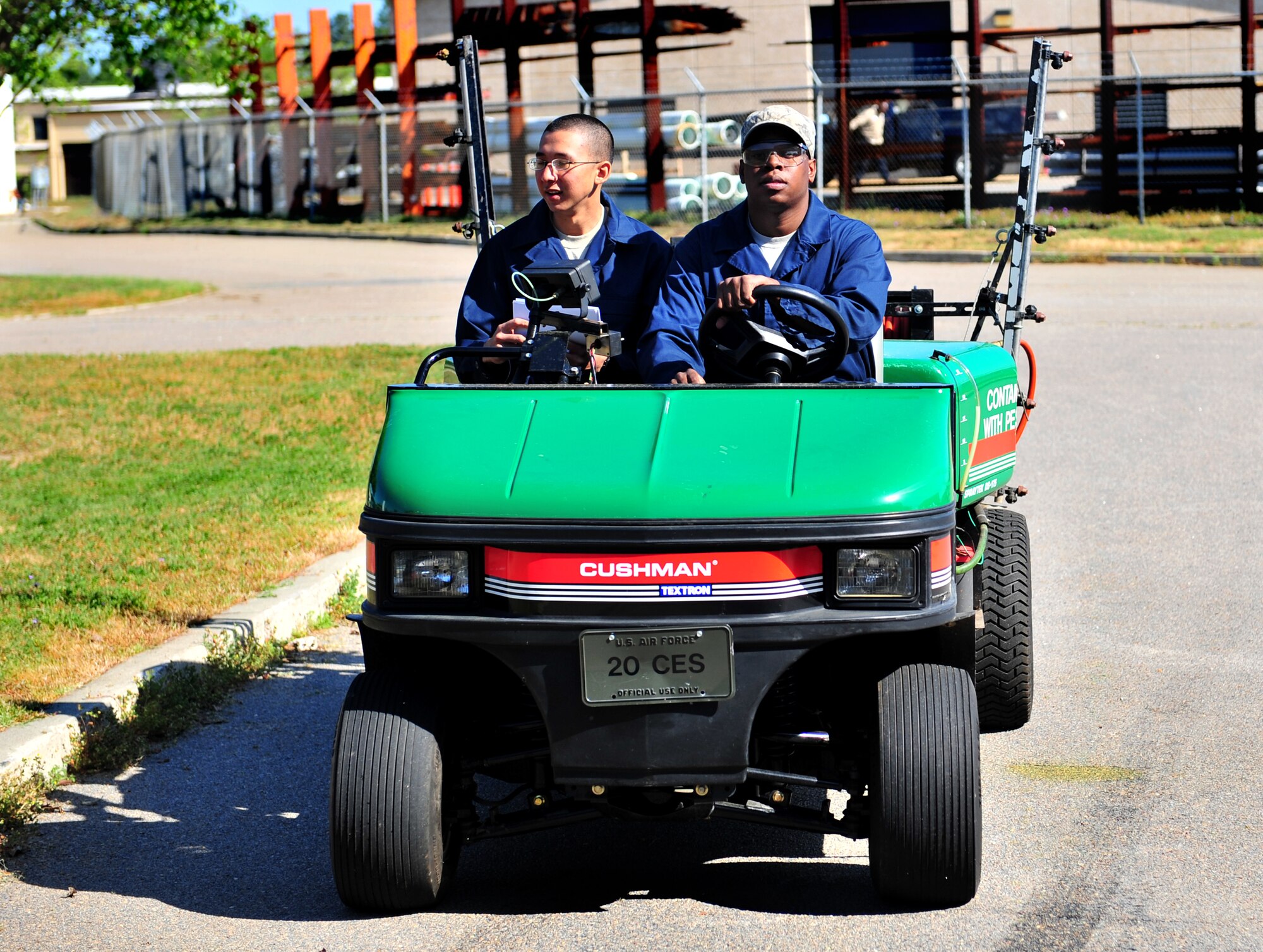 100412-F-8430J-037
SHAW AIR FORCE BASE, S.C. - Senior Airman Terrence Murray (right) and Airman Alvaro Koo, 20th Civil Engineer Squadron entomologists, leave in a work truck for a house call April 12, 2010. The 20th CES entomologists specialize in pest control, eliminating weeds, and conducting health inspections. The 20th CES entomologists are vital to the Air Force since they are in charge of diseases and pest control so troops and families can stay healthy. (U.S. Air Force photo/Airman 1st Class Amber E. N. Jacobs)