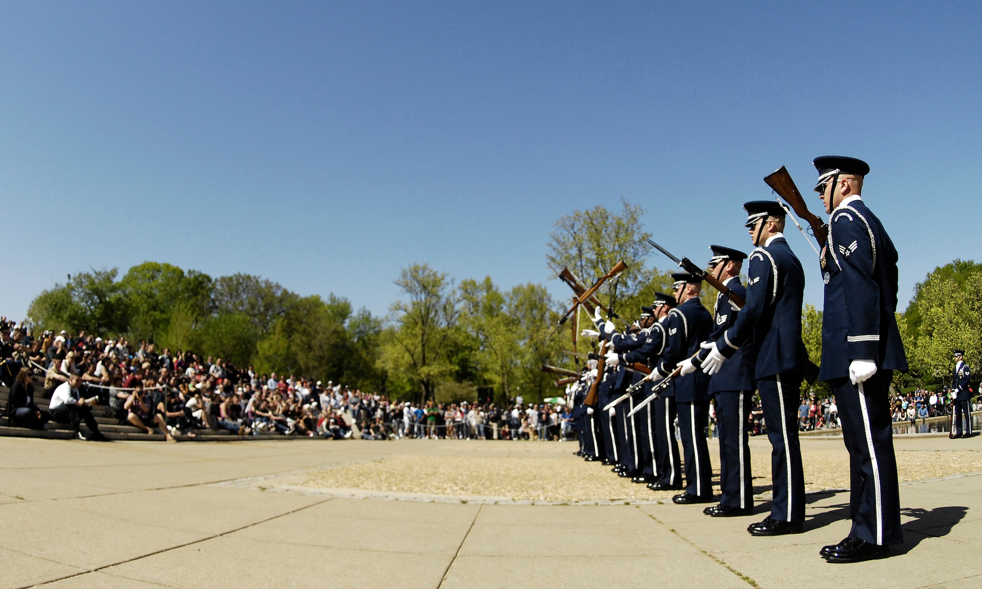 Members of the U.S. Air Force Honor Guard Drill Team perform during the 3rd Annual Joint Service Drill Team Exhibition April 10 at the Lincoln Memorial in Washington, D.C. The event featured drill team performances from all five military branches. (U.S. Air Force photo by Staff Sgt. Dan DeCook) 
