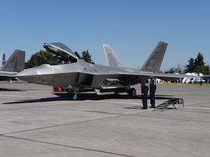 SANTIAGO, Chile -- Air Combat Command's F-22 Raptor Demonstration Team prepare for a flight during the FIDAE air and trade show in Santiago, Chile March 25th.  The Raptor Demonstration Team flew throughout the international event and also met with local community leaders, hosted children from various charitable organizations and visited a hospital for ill children. Airmen were so moved by their interaction with the Chilean children, at the conclusion of the show, the Air Force delegation made a personal donation to the Make a Wish program.