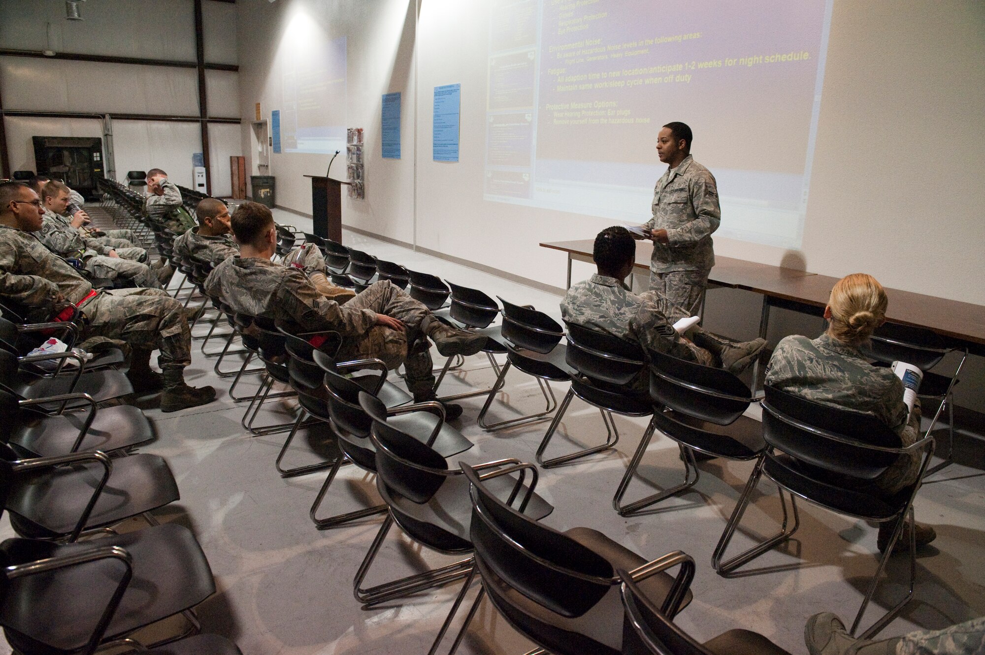 HOLLOMAN AIR FORCE BASE, N.M. -- Airman 1st Class Deadra Taylor with the 49th Medical Group briefs exercise participants, April 13, 2010, during a Phase I exercise. The 49th Fighter Wing is conducting a week-long Phase I exercise to evaluate the wing's preparedness to deploy to any location, worldwide. During this event, the 49th FW will process over 450 personnel and 360 short tons of cargo using the same systems and procedures that they would use if called upon to deploy. (U.S. Air Force photo by Staff Sgt. Joe Laws / Released)