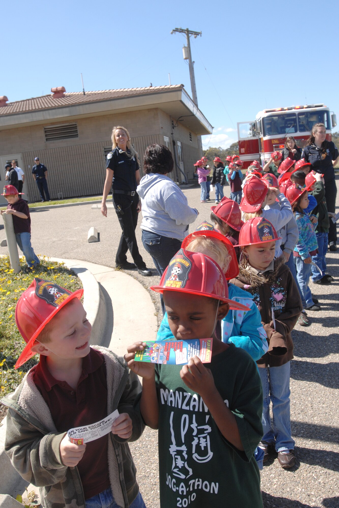 VANDENBERG AIR FORCE BASE, Calif. – Students of Manzanita Elementary School get ready to board a school bus at the end of the 9-1-1 For Kids event here Tuesday, April 13, 2010. Approximately 230 students from Manzanita Elementary School attended the event. (U.S. Air Force photo/Senior Airman Christopher Hubenthal) 