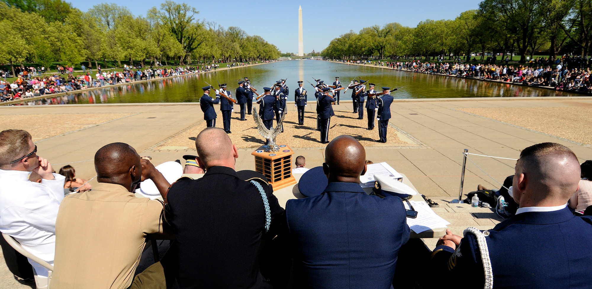 A panel of judges from the five U.S. military branches views a performance by the U.S. Air Force Honor Guard Drill Team during the 3rd Annual Joint Service Drill Team Exhibition April 10 at the Lincoln Memorial in Washington, D.C. The event featured drill team performances from all five military branches. (U.S. Air Force photo by Staff Sgt. Dan DeCook)