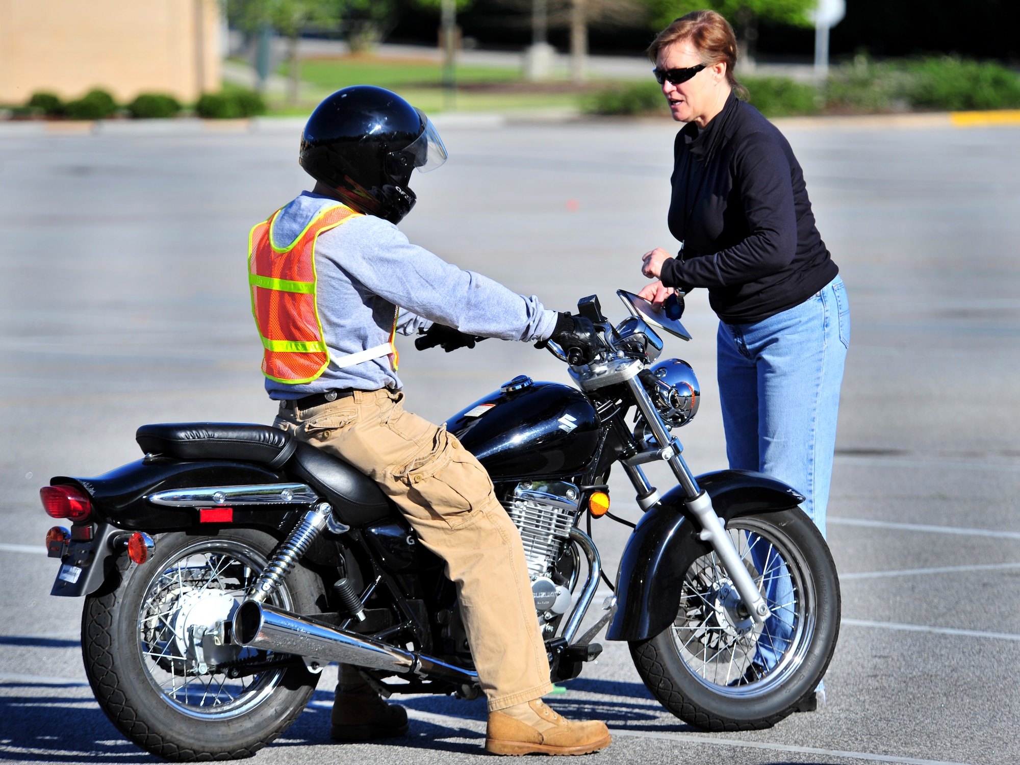 100412-F-8430J-142
COLUMBIA, S.C. - Karen Weinkle (right), an instructor at Midlands Technical College, gives course instructions to Airman Stewart Crotts, 20th Logistic Readiness Squadron, April 10, 2010. Midlands Technical College offers a motorcycle safety course to local residents and military members. The safety course is mandated by the Air Force, and teaches all riders the basic skills needed for safe motorcycle operations. (U.S. Air Force photo/Airman 1st Class Amber E. N. Jacobs)