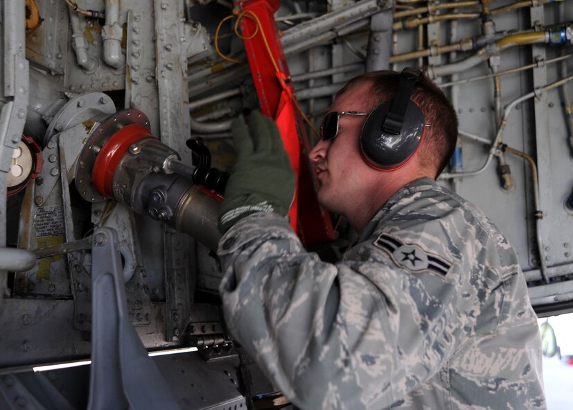 MCCONNELL AIR FORCE BASE, Kan. -- Airman 1st Class Jesse Oliver, 22nd Aircraft Maintenance Squadron crew chief, refuels a KC-135 Stratotanker aircraft, April 7, 2010, McConnell Air Force Base, Kan. The Airmen assigned to the fuels management flight are responsible for refueling aircraft assigned here and any that travel through McConnell, 24 hours a day, seven days a week. (U.S. Air Force photo/Airman 1st Class Andrea Salazar)