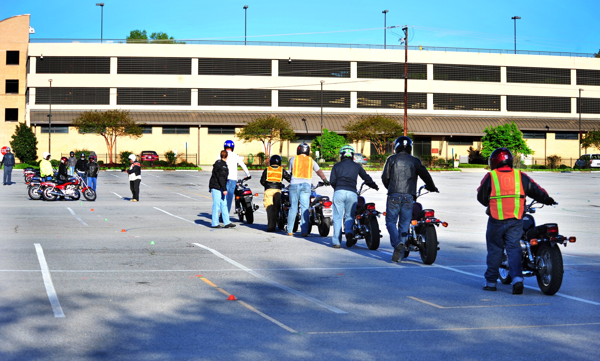 100412-F-8430J-091
COLUMBIA, S.C. - Karen Weinkle (center), an instructor at Midlands Technical College, directs students down the motorcycle safety course in preparation for their first ride April 10, 2010. Midlands Technical College offers a motorcycle safety course to local residents and military members. The safety course is mandated by the Air Force, and teaches all riders the basic skills needed for safe motorcycle operations. (U.S. Air Force photo/Airman 1st Class Amber E. N. Jacobs)
