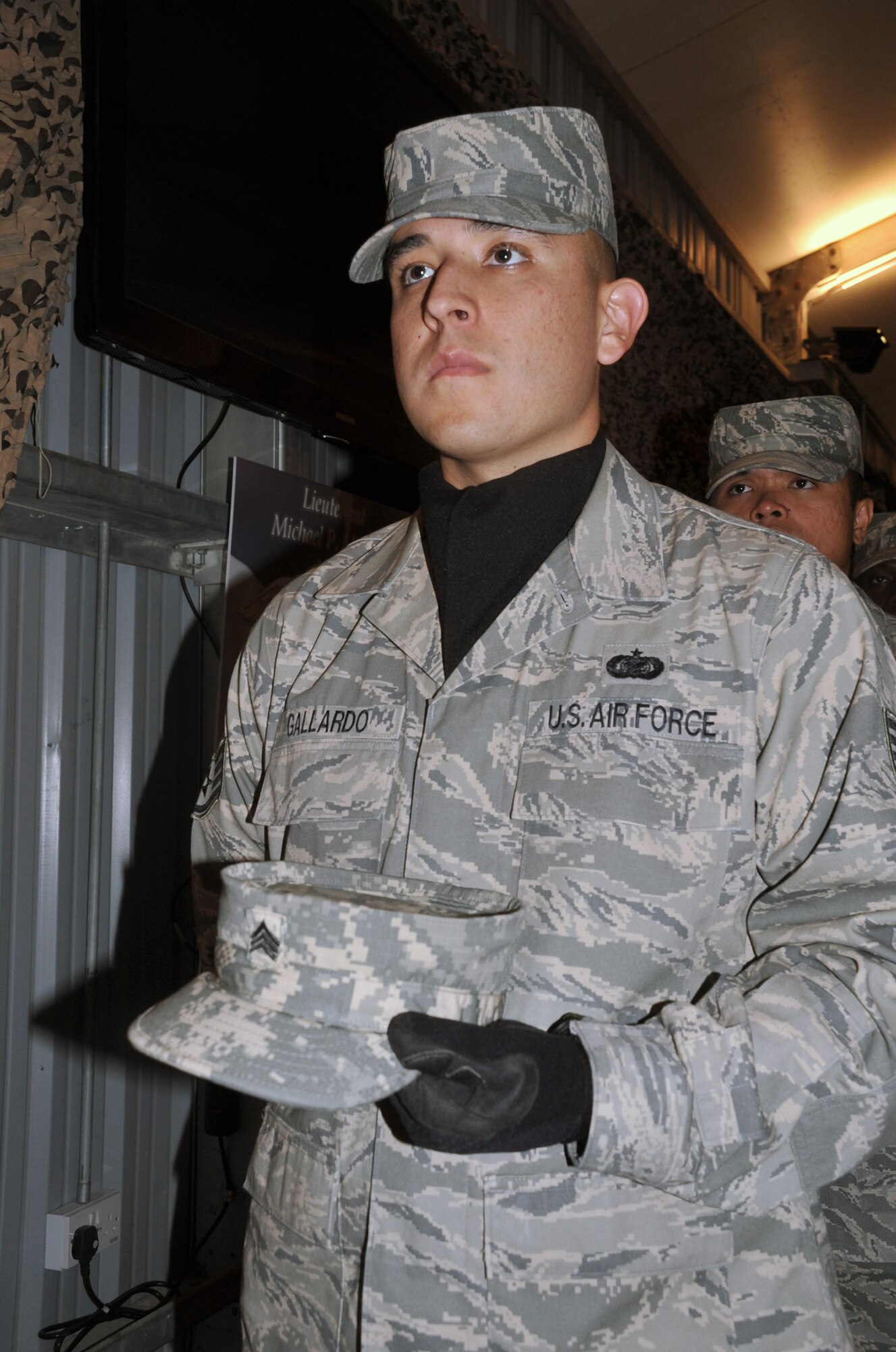 Staff Sgt. Leonel M. Gallardo, knowledge operations manager for the 380th Expeditionary Maintenance Group, participates in a wing event as a member of the 380th Air Expeditionary Wing Honor Guard on April 12, 2010.  Sergeant Gallardo is deployed from the 18th Civil Engineer Group at Kadena Air Base, Japan, and his hometown is Phoenix, Ariz. (U.S. Air Force Photo/Master Sgt. Scott T. Sturkol/Released)