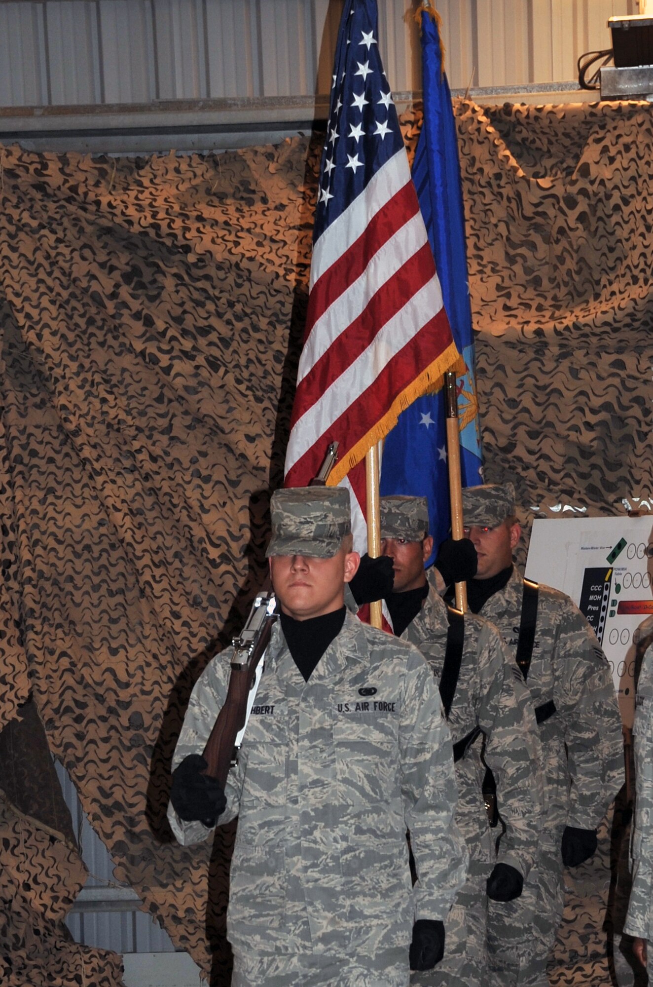 Airman Kasey Cuthbert, a material management apprentice with the 380th Expeditionary Logistics Readiness Squadron, leads participation by the 380th Air Expeditionary Wing Honor in the Medal of Honor Dining In held on April 12, 2010, at a non-disclosed base in Southwest Asia. Airman Cuthbert is deployed from the 366th Logistics Readiness Squadron at Mountain Home Air Force Base, Idaho, and his hometown is Massillon, Ohio. (U.S. Air Force Photo/Master Sgt. Scott T. Sturkol/Released)