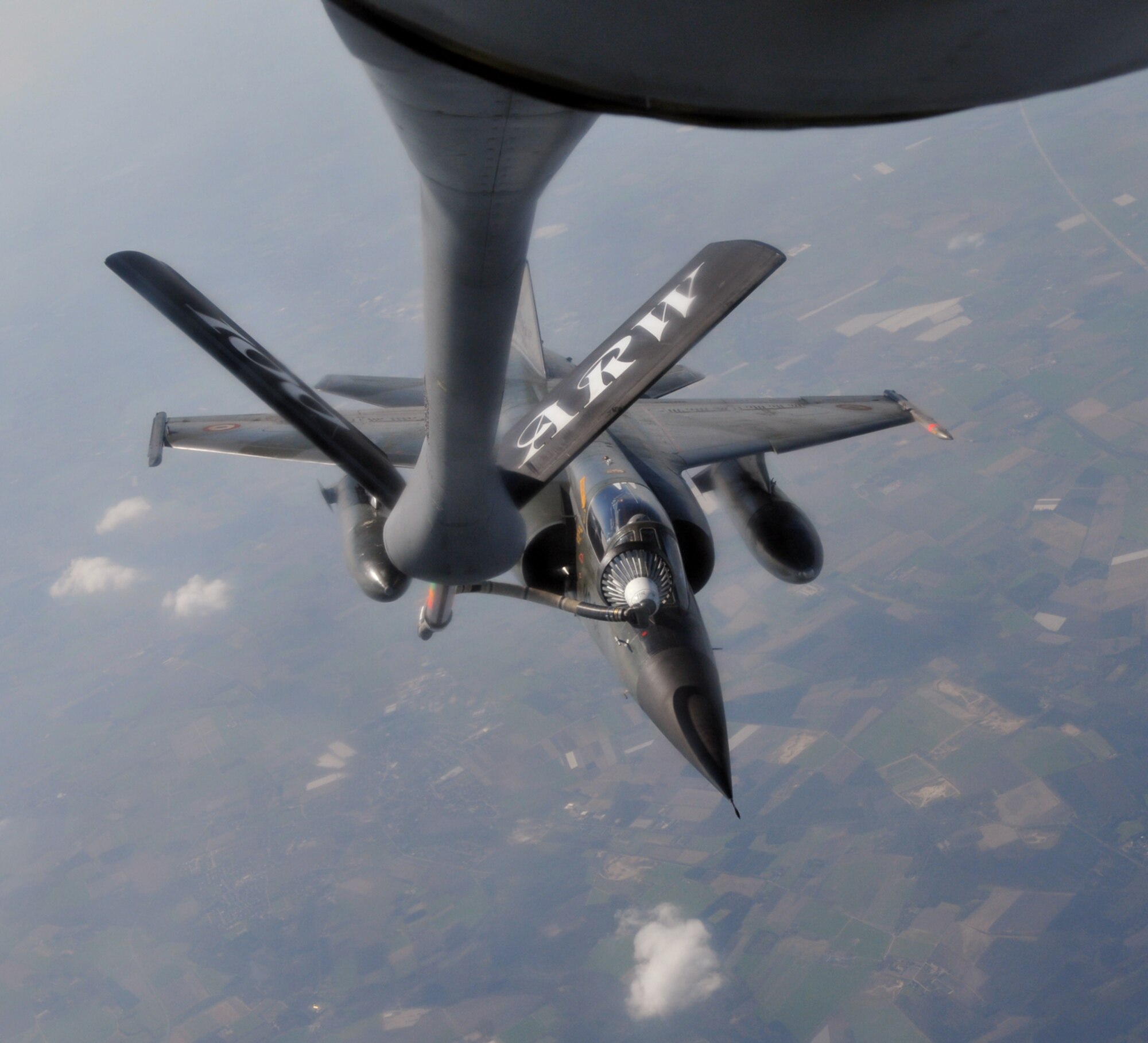 RAF MILDENHALL, England – A French Mirage F1 fighter refuels off a 100th Air Refueling Wing KC-135 during Exercise BRILLIANT ARDENT April 14.  The large scale NATO Response Force Air Live Exercise hosted by Germany began April 12 and will run through April 22. Participation by U.S. Air Forces in Europe units directly aligns with the command key mission areas of providing forces for global operations and building partnership.  (U.S. Air Force photo/Staff Sgt. Austin M. May)
