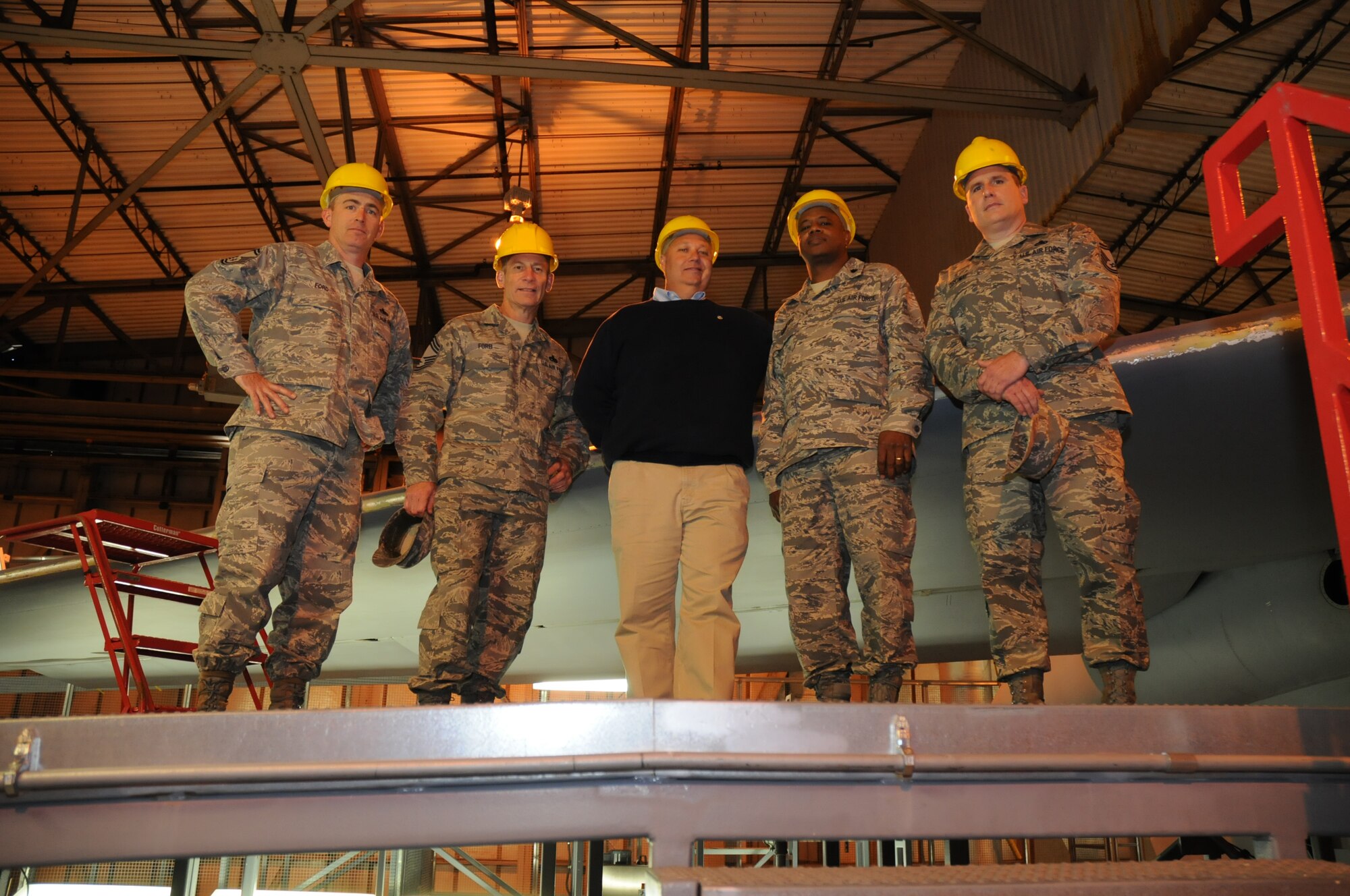 Members of the 512th Maintenance Squadron gave a tour to their honorary commander Bill Klemkowski, chairman of the board, Rehoboth-Dewey Chamber of Commerce, April 10 during the 512th Airlift Wing's unit training assembly. Pictured from left to right is Senior Master Sgt. Bryan Ford, Chief Master Sgt. Chris Ford, Mr. Klemkowski, 512th MXS Commander Lt. Col. Rolandrias Bradford and Senior Master Sgt. Gregory Ordway. (U.S. Air Force photo/Staff Sgt. Steve Lewis)