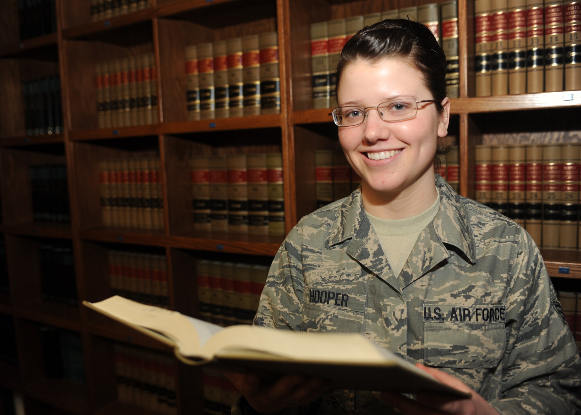 MINOT AIR FORCE BASE, N.D. -- Senior Airman Krystal Hooper, 5th Bomb Wing paralegal, was recently selected as the 8th Air Force Outstanding Paralegal Airman of the Year. The award is based on demonstrated superior initiative, technical skill, leadership ability and devotion to duty and is among the highest distinctions an Air Force paralegal can receive and recognizes Airmen in the grade of technical sergeant and below. (U.S. Air Force photo by Airman 1st Class Aaron-Forrest Wainright)