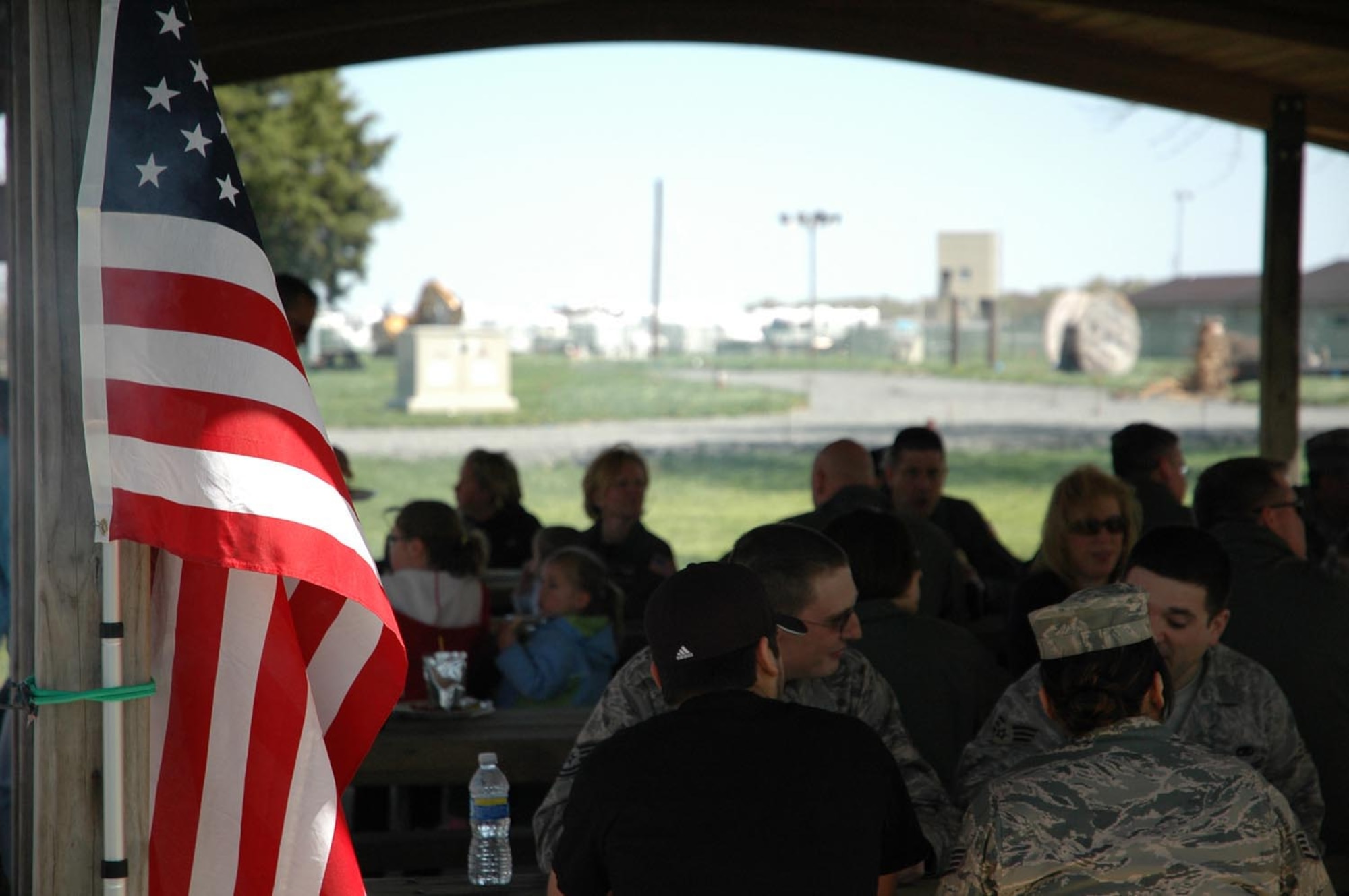 Mobilized 512th Airlift Wing members and their families were invited to take part in a burger burn and resource fair April 10 at the Eagles Nest picnic area. The Airmen were encouraged to bring their families to the event to access information on the resources available to deployed families, as well as network with others in a similar situation. Approximately 300 Liberty Wing reservists are activated for roughly six months, providing sustainment for Operation Enduring Freedom's movement of 30,000 additional U.S. troops. (U.S Air Force photo/Staff Sgt. James Bolinger)
