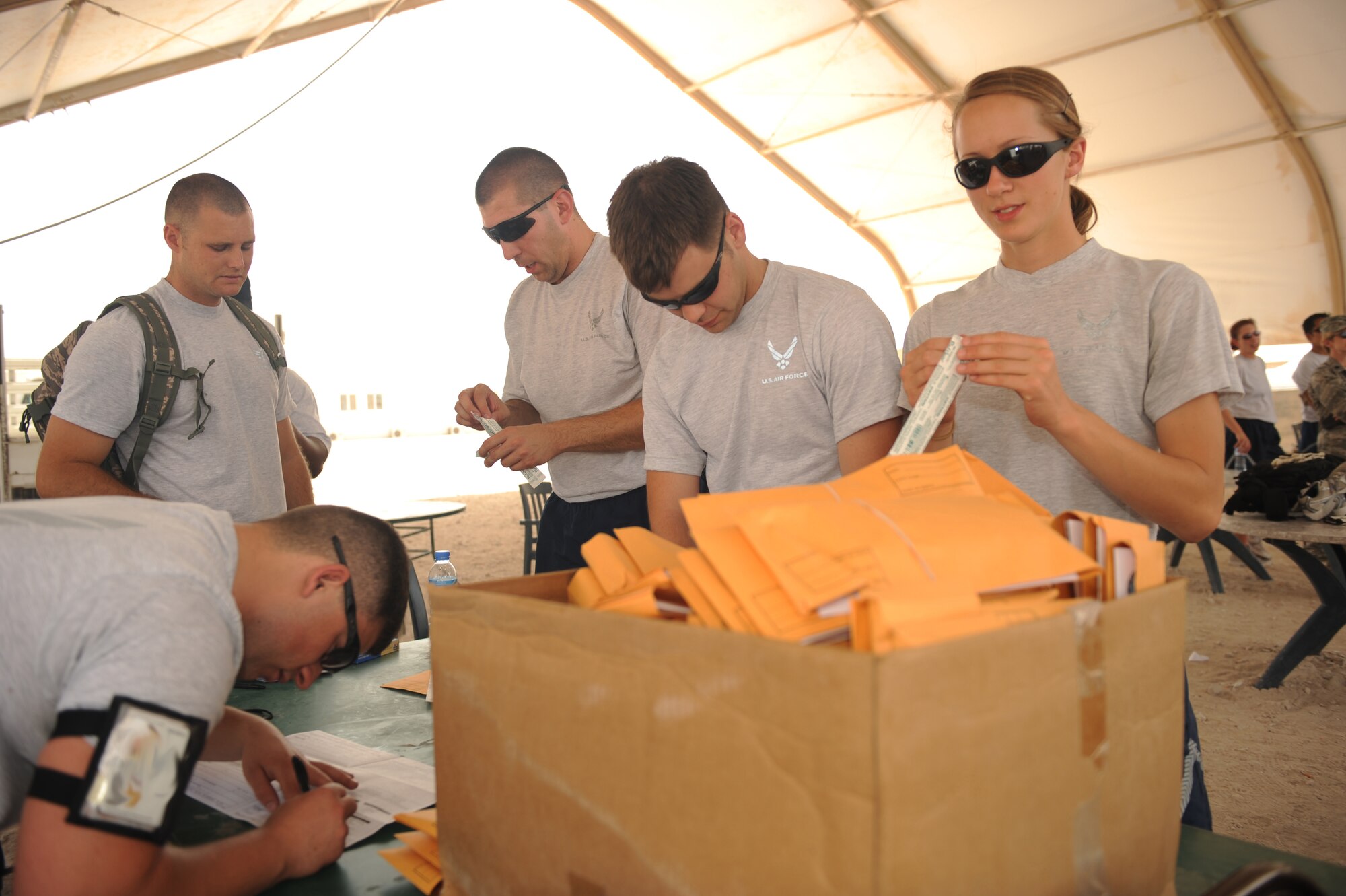 Airmen register with the C.W. Bill Young/DOD Marrow Donor Program during the base firefighter games at a non-disclosed Southwest Asia location, Apr 10, 2010. (U.S. Air Force photo by Tech. Sgt. Michelle Larche)[RELEASED]